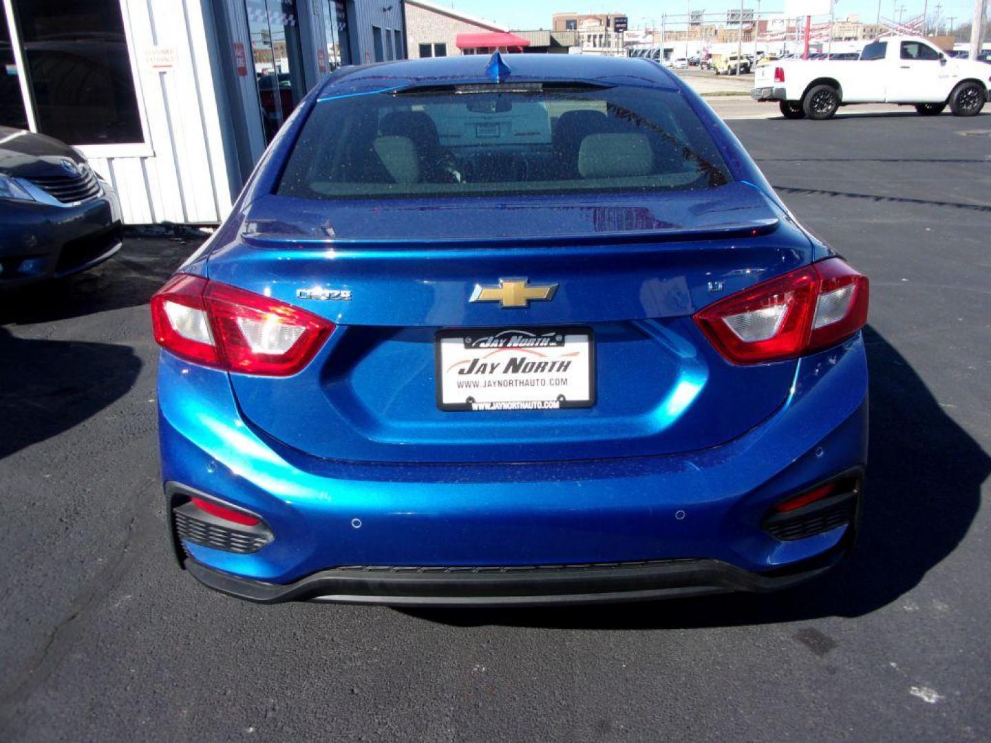 2018 BLUE CHEVROLET CRUZE LT (1G1BE5SM7J7) with an 1.4L engine, Automatic transmission, located at 501 E. Columbia St., Springfield, OH, 45503, (800) 262-7122, 39.925262, -83.801796 - Photo#4