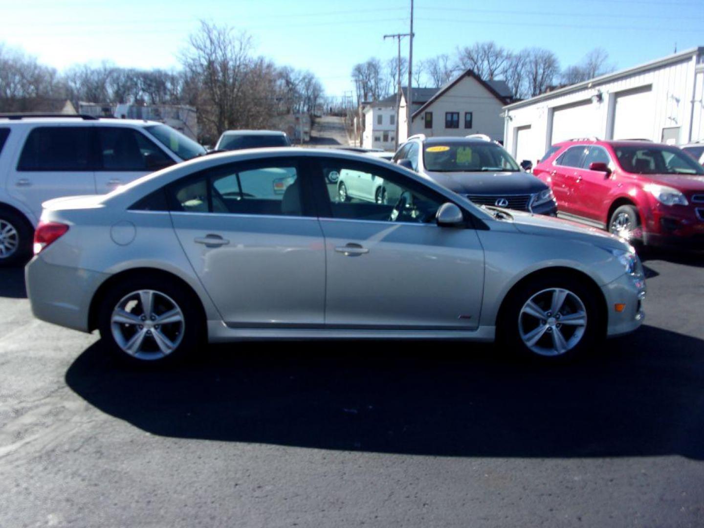 2016 GOLD CHEVROLET CRUZE LIMITED LT (1G1PF5SB0G7) with an 1.4L engine, Automatic transmission, located at 501 E. Columbia St., Springfield, OH, 45503, (800) 262-7122, 39.925262, -83.801796 - Photo#0