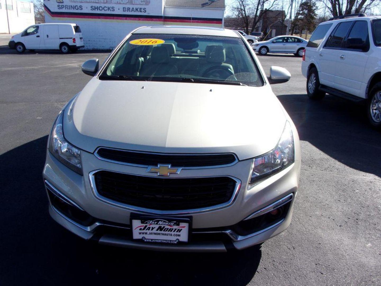 2016 GOLD CHEVROLET CRUZE LIMITED LT (1G1PF5SB0G7) with an 1.4L engine, Automatic transmission, located at 501 E. Columbia St., Springfield, OH, 45503, (800) 262-7122, 39.925262, -83.801796 - Photo#1