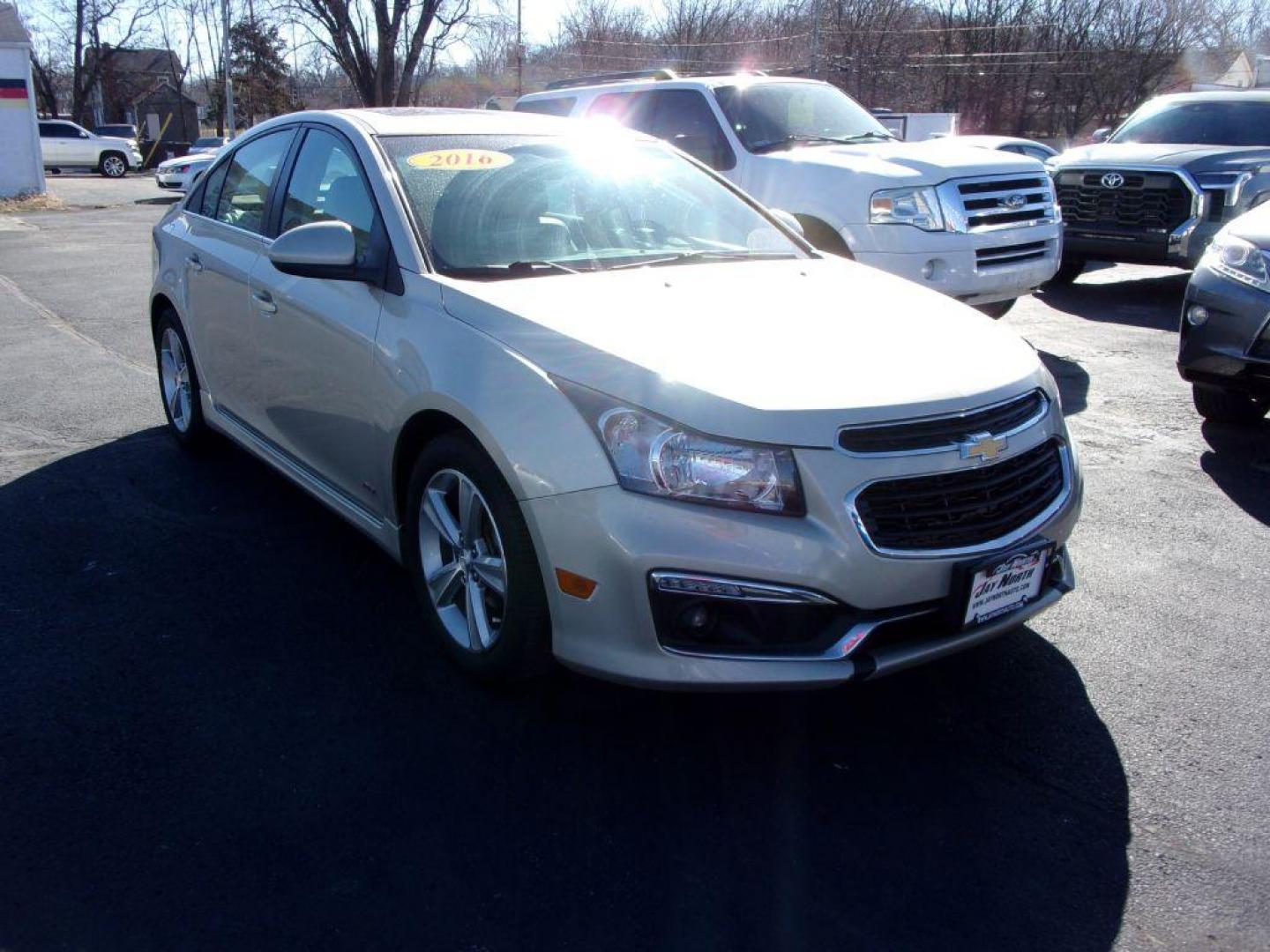 2016 GOLD CHEVROLET CRUZE LIMITED LT (1G1PF5SB0G7) with an 1.4L engine, Automatic transmission, located at 501 E. Columbia St., Springfield, OH, 45503, (800) 262-7122, 39.925262, -83.801796 - Photo#2