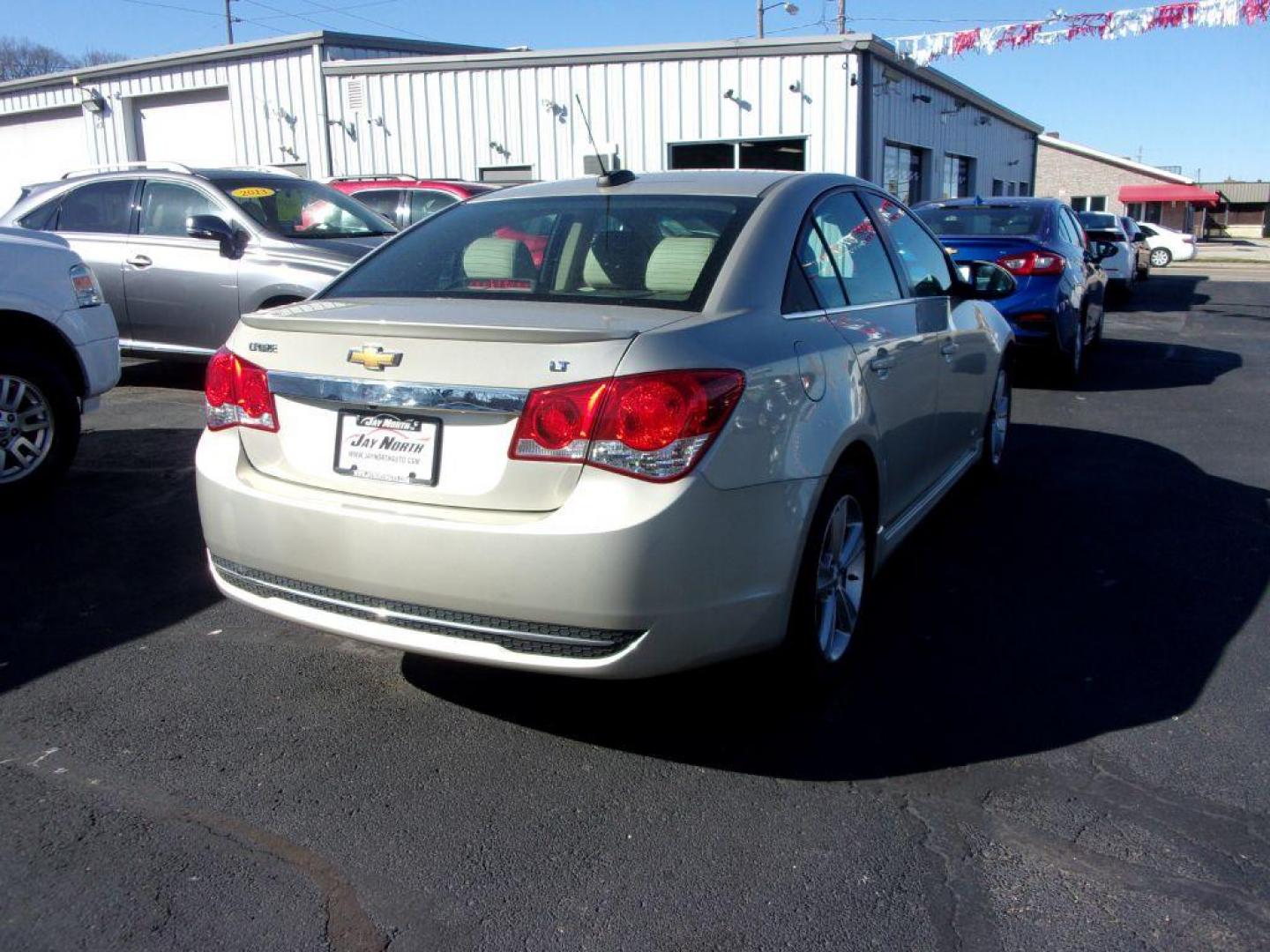 2016 GOLD CHEVROLET CRUZE LIMITED LT (1G1PF5SB0G7) with an 1.4L engine, Automatic transmission, located at 501 E. Columbia St., Springfield, OH, 45503, (800) 262-7122, 39.925262, -83.801796 - Photo#3