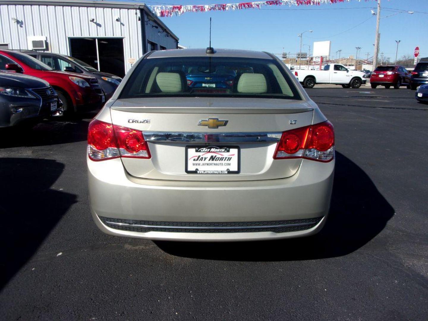 2016 GOLD CHEVROLET CRUZE LIMITED LT (1G1PF5SB0G7) with an 1.4L engine, Automatic transmission, located at 501 E. Columbia St., Springfield, OH, 45503, (800) 262-7122, 39.925262, -83.801796 - Photo#4