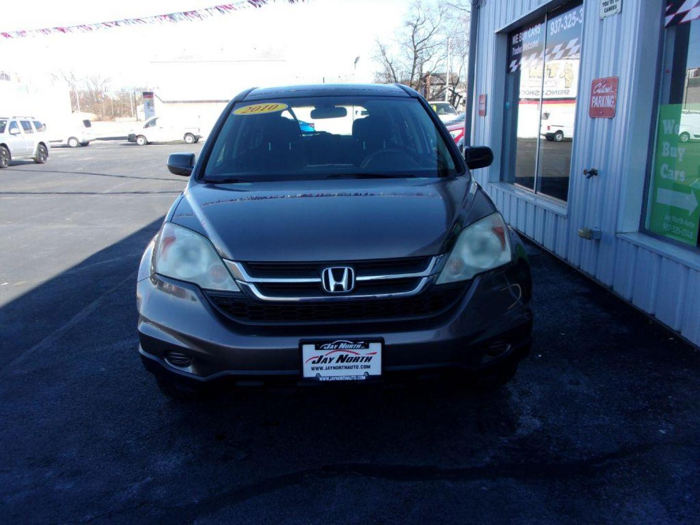 2010 BROWN HONDA CR-V LX (5J6RE4H31AL) with an 2.4L engine, Automatic transmission, located at 501 E. Columbia St., Springfield, OH, 45503, (800) 262-7122, 39.925262, -83.801796 - Photo#1