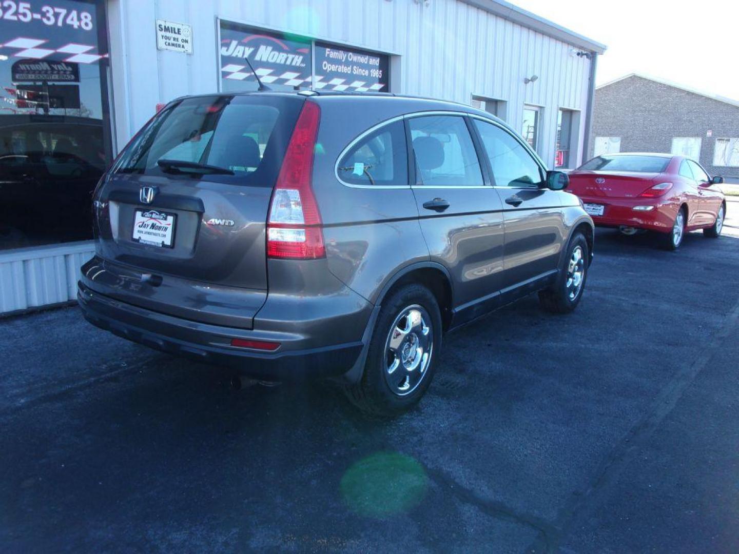 2010 BROWN HONDA CR-V LX (5J6RE4H31AL) with an 2.4L engine, Automatic transmission, located at 501 E. Columbia St., Springfield, OH, 45503, (800) 262-7122, 39.925262, -83.801796 - Photo#3