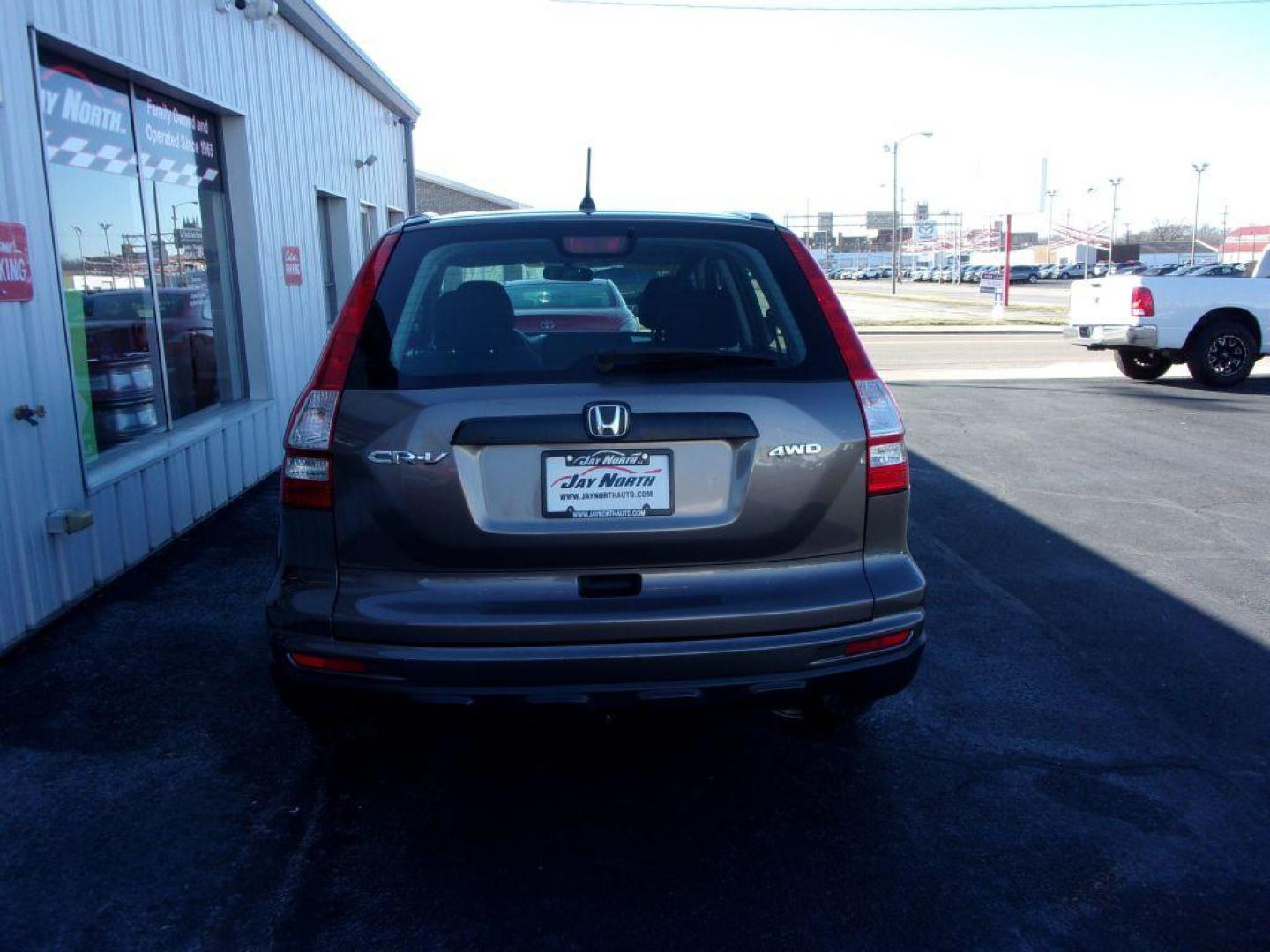 2010 BROWN HONDA CR-V LX (5J6RE4H31AL) with an 2.4L engine, Automatic transmission, located at 501 E. Columbia St., Springfield, OH, 45503, (800) 262-7122, 39.925262, -83.801796 - Photo#4