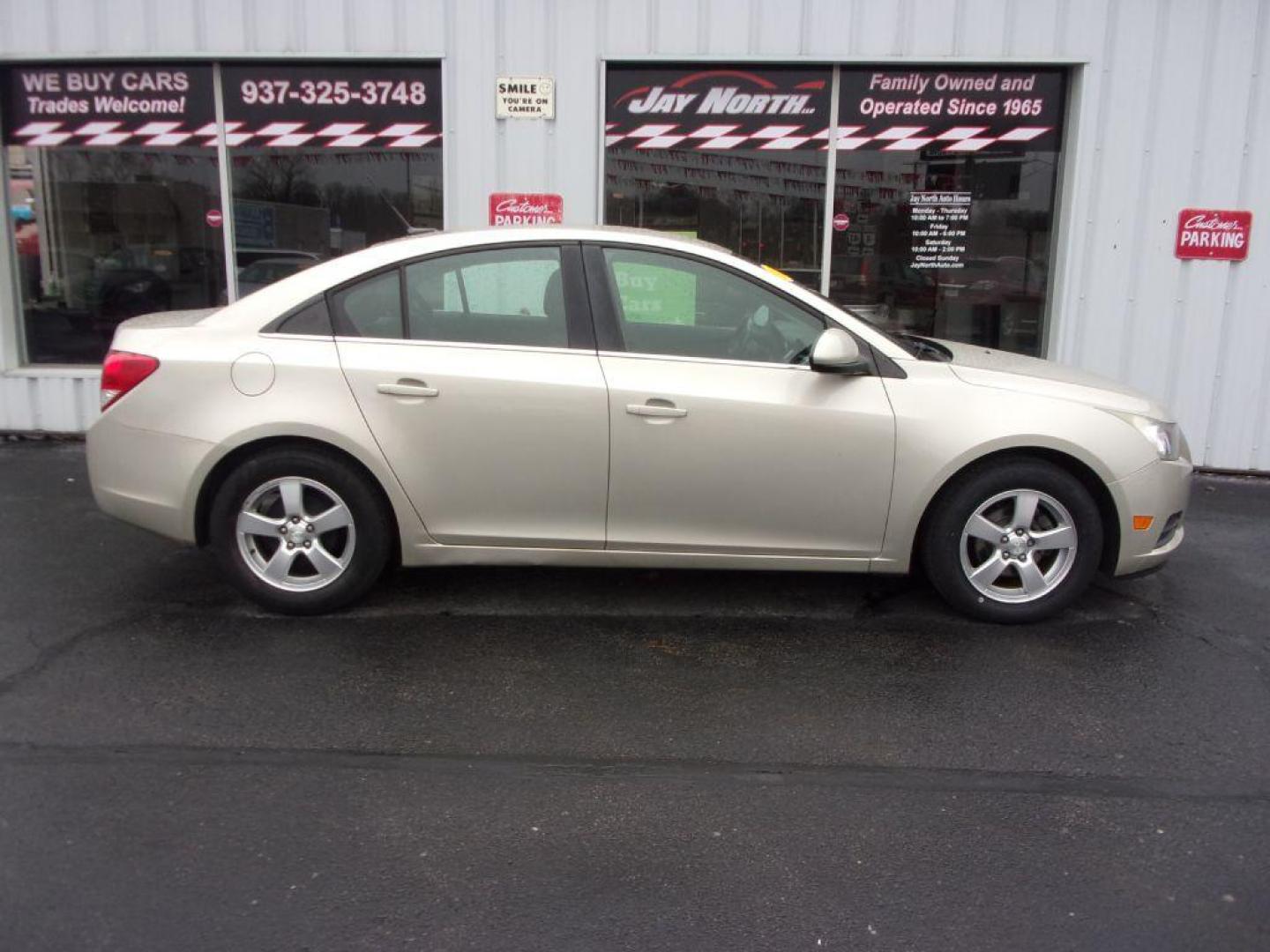 2013 GOLD CHEVROLET CRUZE LT (1G1PC5SB8D7) with an 1.4L engine, Automatic transmission, located at 501 E. Columbia St., Springfield, OH, 45503, (800) 262-7122, 39.925262, -83.801796 - Photo#0