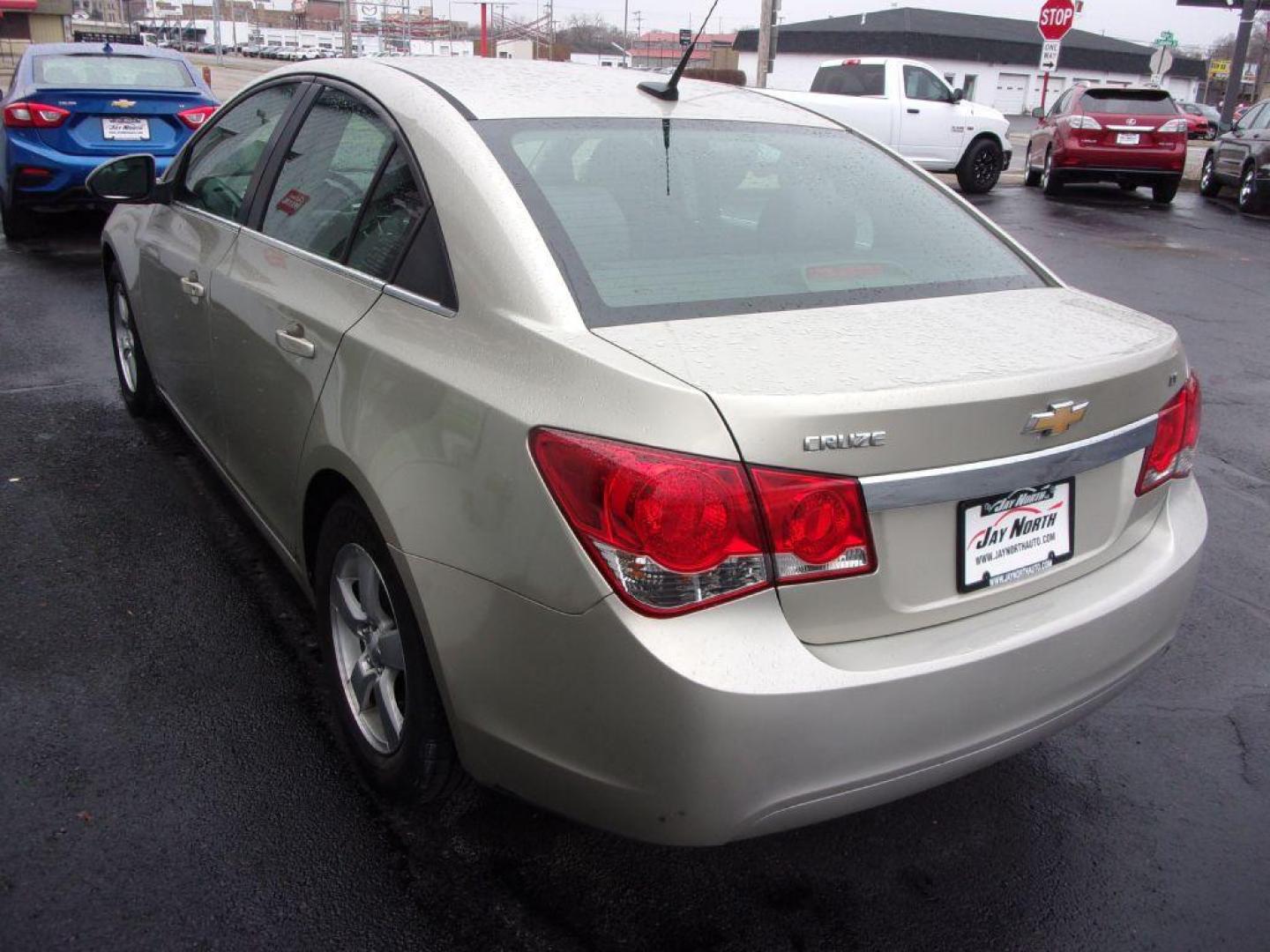 2013 GOLD CHEVROLET CRUZE LT (1G1PC5SB8D7) with an 1.4L engine, Automatic transmission, located at 501 E. Columbia St., Springfield, OH, 45503, (800) 262-7122, 39.925262, -83.801796 - Photo#4