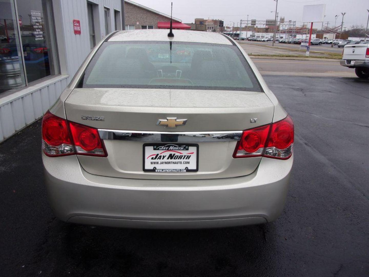 2013 GOLD CHEVROLET CRUZE LT (1G1PC5SB8D7) with an 1.4L engine, Automatic transmission, located at 501 E. Columbia St., Springfield, OH, 45503, (800) 262-7122, 39.925262, -83.801796 - Photo#5