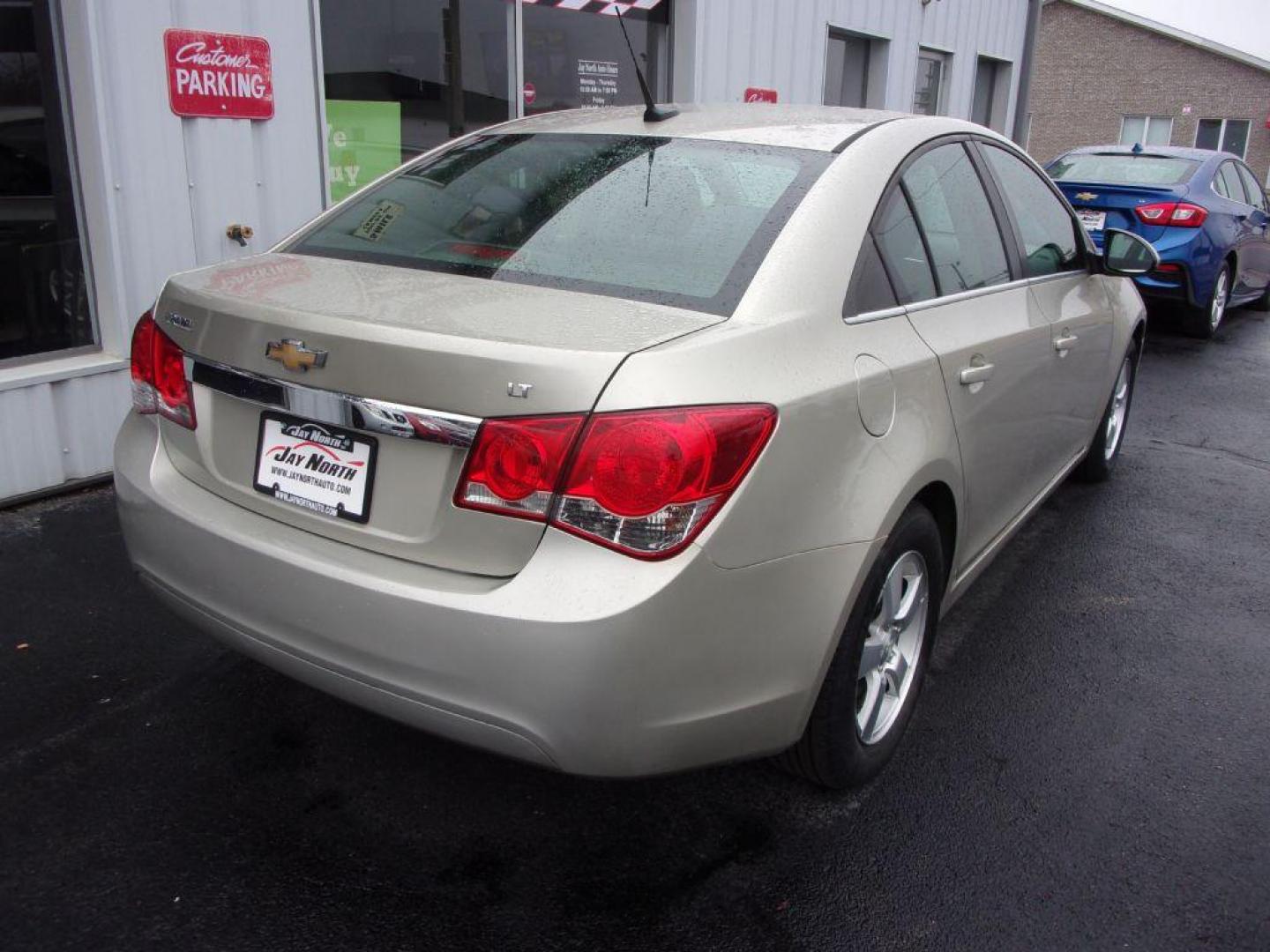 2013 GOLD CHEVROLET CRUZE LT (1G1PC5SB8D7) with an 1.4L engine, Automatic transmission, located at 501 E. Columbia St., Springfield, OH, 45503, (800) 262-7122, 39.925262, -83.801796 - Photo#6