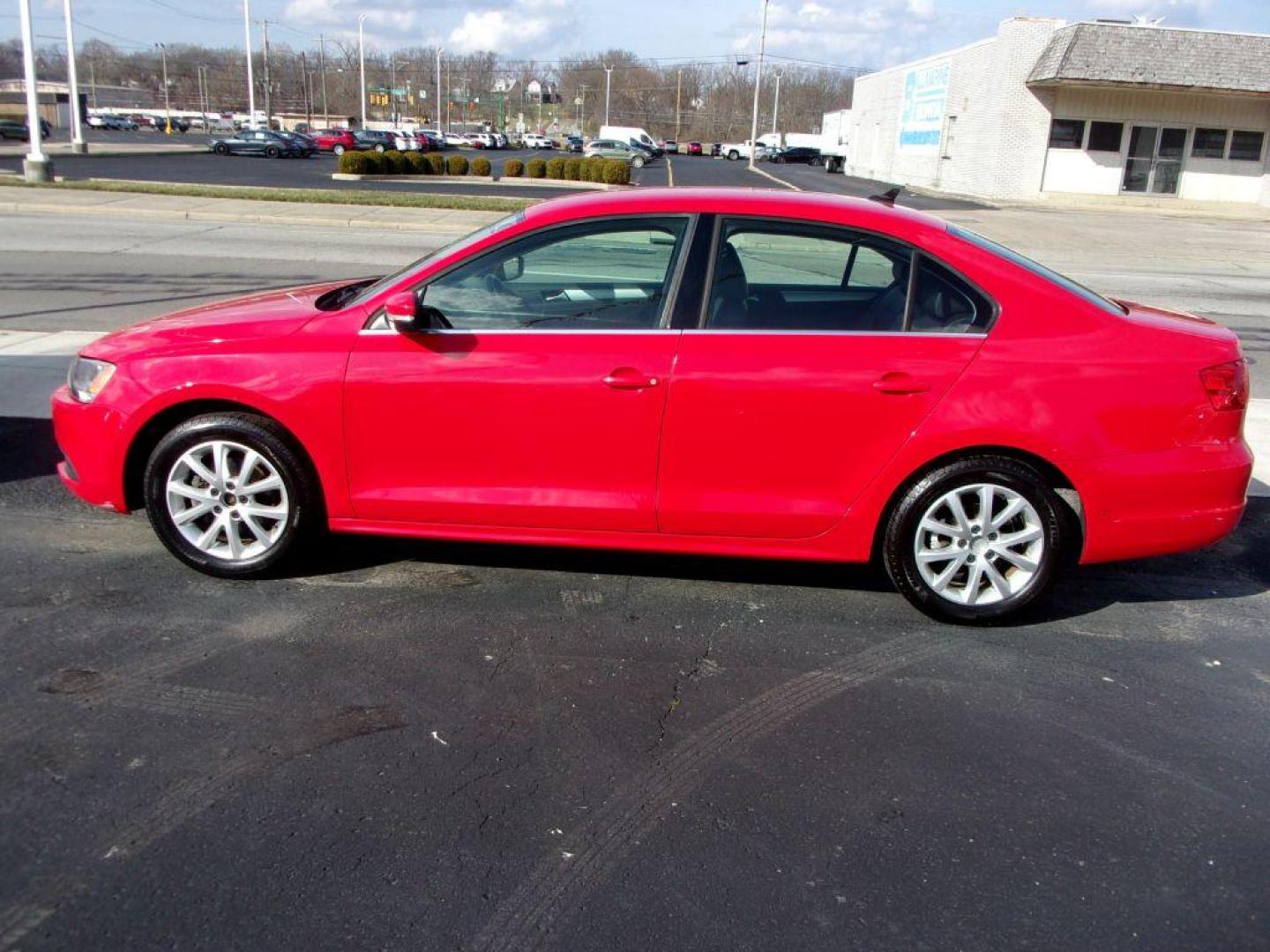 2014 RED VOLKSWAGEN JETTA SE (3VWD07AJ8EM) with an 1.8L engine, Automatic transmission, located at 501 E. Columbia St., Springfield, OH, 45503, (800) 262-7122, 39.925262, -83.801796 - Photo#0