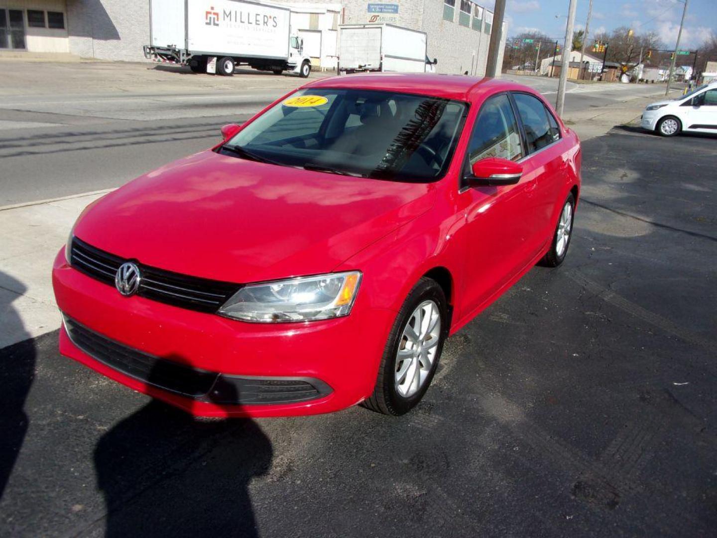 2014 RED VOLKSWAGEN JETTA SE (3VWD07AJ8EM) with an 1.8L engine, Automatic transmission, located at 501 E. Columbia St., Springfield, OH, 45503, (800) 262-7122, 39.925262, -83.801796 - Photo#1