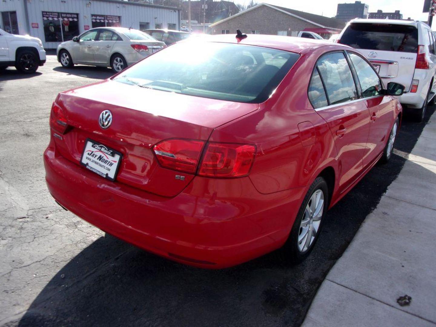 2014 RED VOLKSWAGEN JETTA SE (3VWD07AJ8EM) with an 1.8L engine, Automatic transmission, located at 501 E. Columbia St., Springfield, OH, 45503, (800) 262-7122, 39.925262, -83.801796 - Photo#3