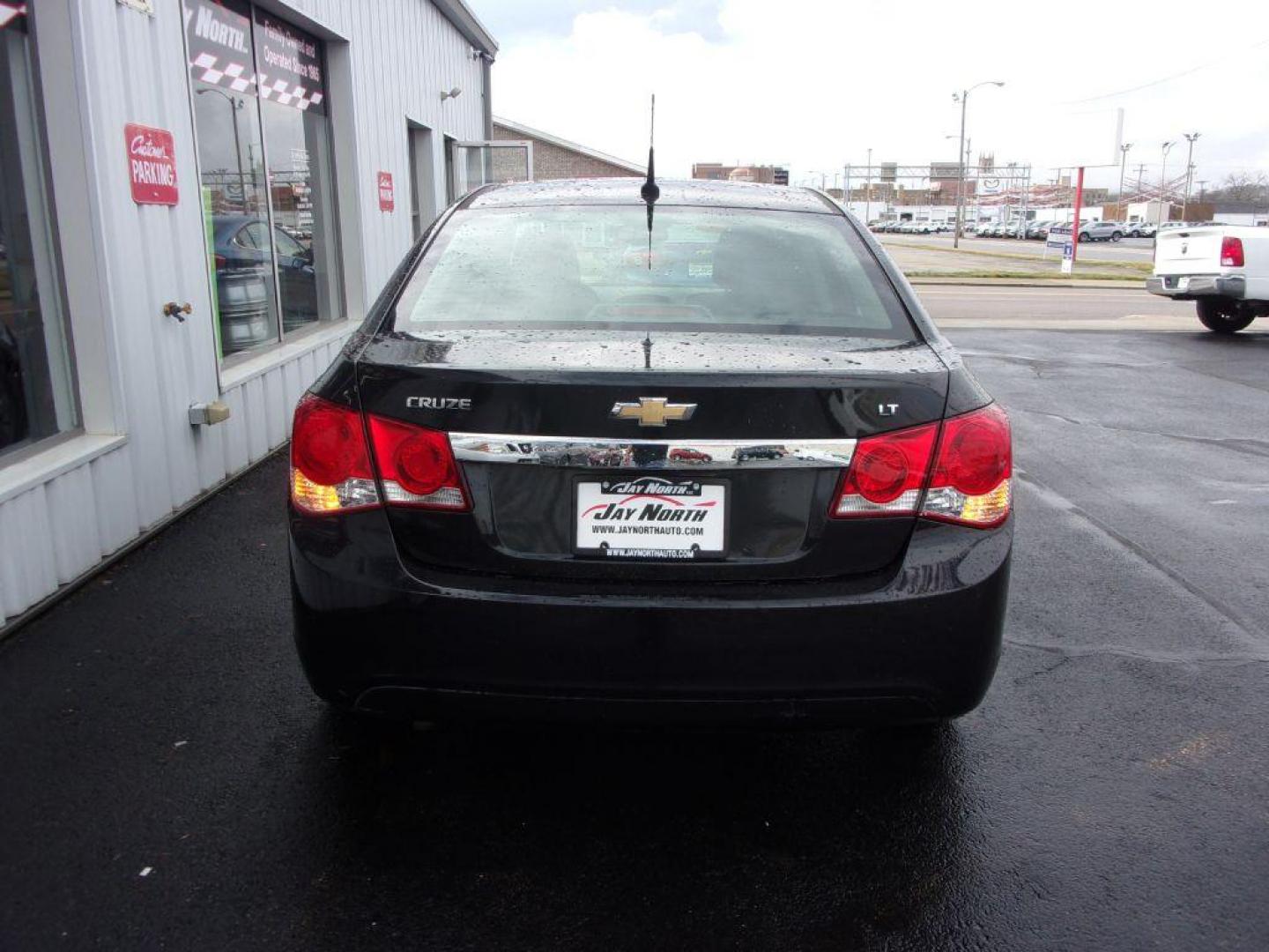 2014 BLACK CHEVROLET CRUZE LT (1G1PC5SB5E7) with an 1.4L engine, Automatic transmission, located at 501 E. Columbia St., Springfield, OH, 45503, (800) 262-7122, 39.925262, -83.801796 - Photo#4