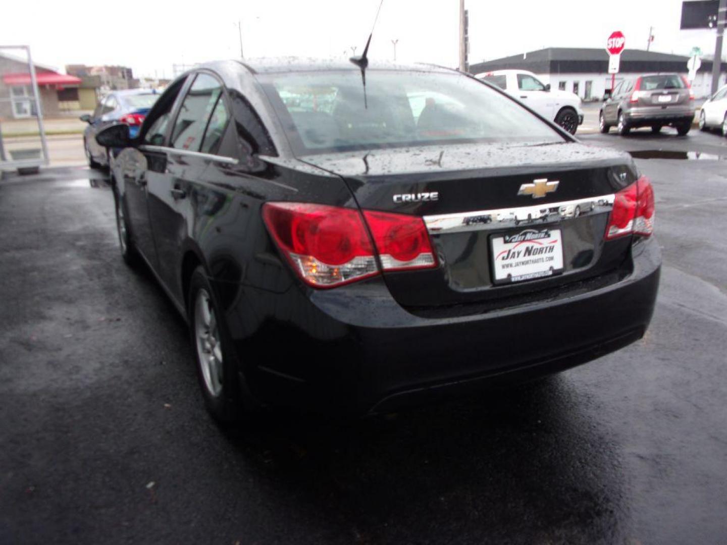 2014 BLACK CHEVROLET CRUZE LT (1G1PC5SB5E7) with an 1.4L engine, Automatic transmission, located at 501 E. Columbia St., Springfield, OH, 45503, (800) 262-7122, 39.925262, -83.801796 - Photo#5