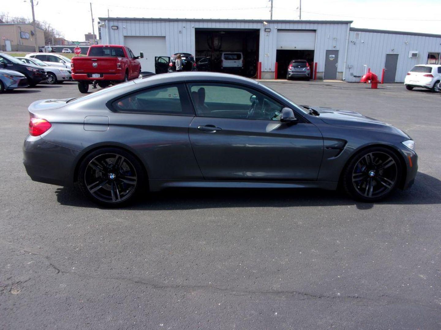 2015 GRAY BMW M4 (WBS3R9C58FK) with an 3.0L engine, 6-Speed Manual transmission, located at 501 E. Columbia St., Springfield, OH, 45503, (800) 262-7122, 39.925262, -83.801796 - ***6 SPEED MANUAL TRANSMISSION*** New oil pan gasket at Kelly BMW, new brakes and 4 new Michelin Pilot Sport 4S tires, all within the last 5K miles. Jay bought this car from a close friend who's owned it since March 2018 with 21000 miles and serviced it religiously at Kelly BMW in Columbus, Oh. O - Photo#0