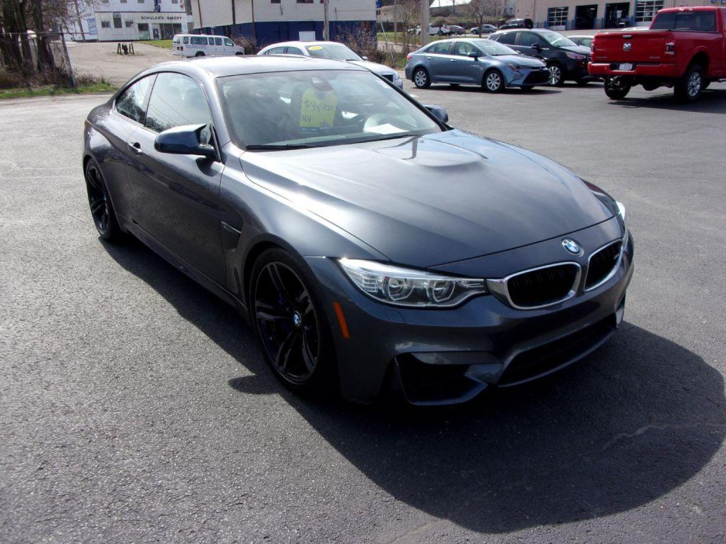 2015 GRAY BMW M4 (WBS3R9C58FK) with an 3.0L engine, 6-Speed Manual transmission, located at 501 E. Columbia St., Springfield, OH, 45503, (800) 262-7122, 39.925262, -83.801796 - ***6 SPEED MANUAL TRANSMISSION*** New oil pan gasket at Kelly BMW, new brakes and 4 new Michelin Pilot Sport 4S tires, all within the last 5K miles. Jay bought this car from a close friend who's owned it since March 2018 with 21000 miles and serviced it religiously at Kelly BMW in Columbus, Oh. O - Photo#1