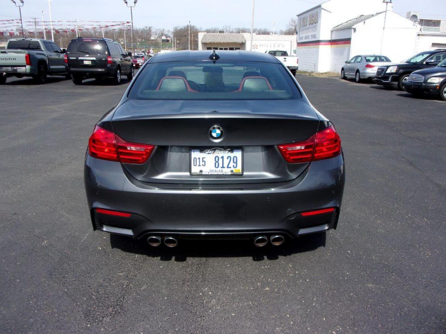 2015 GRAY BMW M4 (WBS3R9C58FK) with an 3.0L engine, 6-Speed Manual transmission, located at 501 E. Columbia St., Springfield, OH, 45503, (800) 262-7122, 39.925262, -83.801796 - ***6 SPEED MANUAL TRANSMISSION*** New oil pan gasket at Kelly BMW, new brakes and 4 new Michelin Pilot Sport 4S tires, all within the last 5K miles. Jay bought this car from a close friend who's owned it since March 2018 with 21000 miles and serviced it religiously at Kelly BMW in Columbus, Oh. O - Photo#3