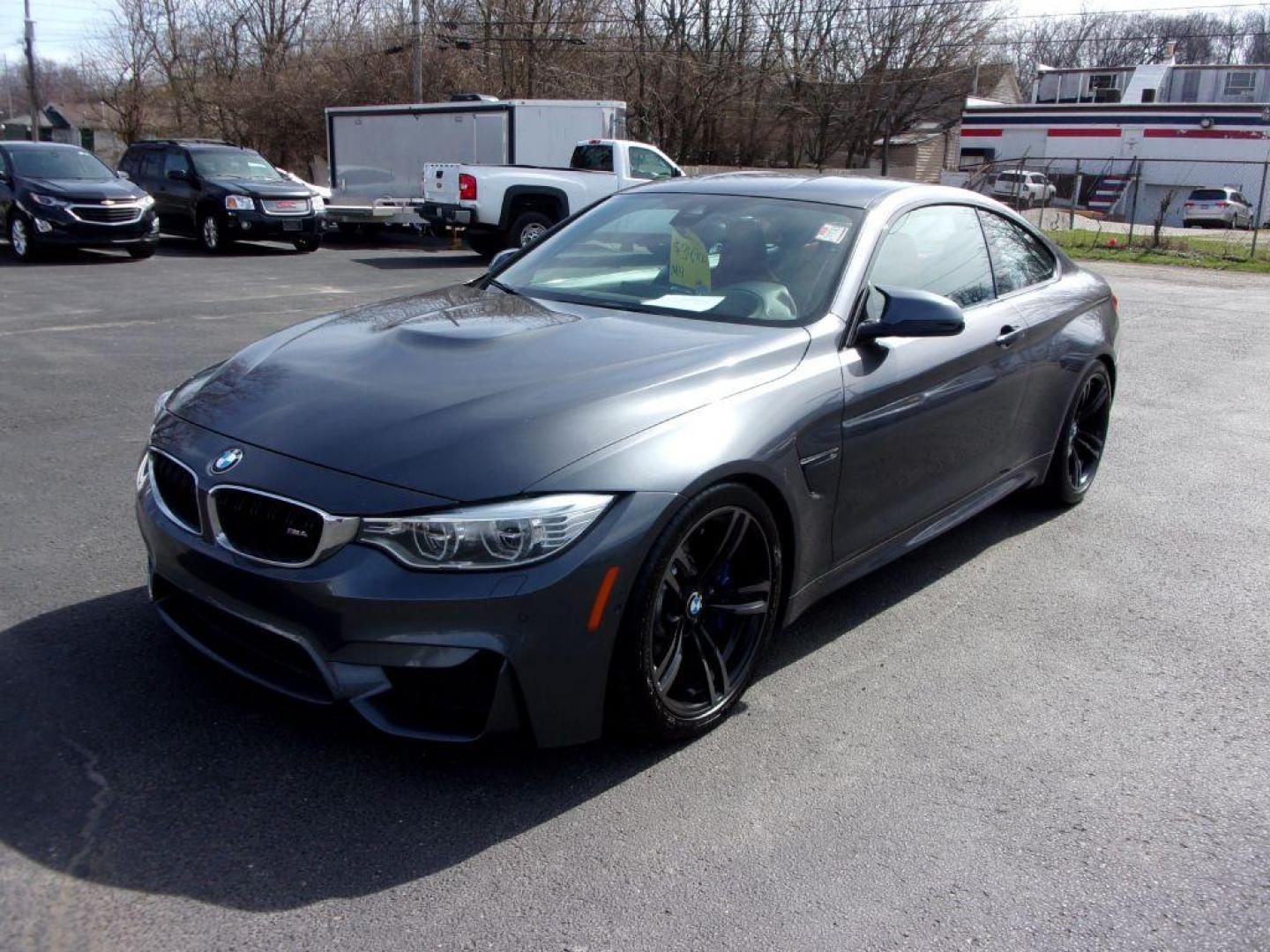 2015 GRAY BMW M4 (WBS3R9C58FK) with an 3.0L engine, 6-Speed Manual transmission, located at 501 E. Columbia St., Springfield, OH, 45503, (800) 262-7122, 39.925262, -83.801796 - ***6 SPEED MANUAL TRANSMISSION*** New oil pan gasket at Kelly BMW, new brakes and 4 new Michelin Pilot Sport 4S tires, all within the last 5K miles. Jay bought this car from a close friend who's owned it since March 2018 with 21000 miles and serviced it religiously at Kelly BMW in Columbus, Oh. O - Photo#5