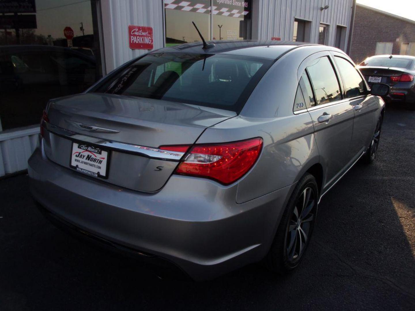 2013 GRAY CHRYSLER 200 S LIMITED (1C3CCBCG3DN) with an 3.6L engine, Automatic transmission, located at 501 E. Columbia St., Springfield, OH, 45503, (800) 262-7122, 39.925262, -83.801796 - *** 31 Service Records on Clean CarFax *** 200 S Limited *** Newer Tires *** Serviced and Detailed *** Boston Acoustics Audio *** Moonroof *** Leather *** Remote Start *** Jay North Auto has offered hand picked vehicles since 1965! Our customer's enjoy a NO pressure buying experience with a sma - Photo#6