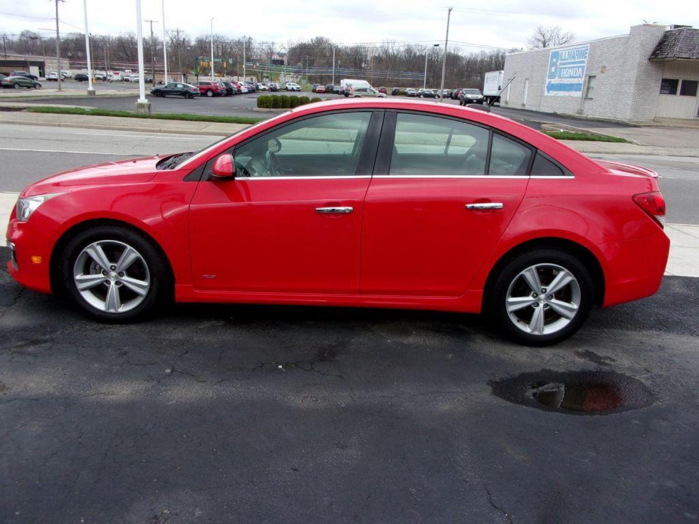 2015 RED CHEVROLET CRUZE 2LT (1G1PE5SB4F7) with an 1.4L engine, Automatic transmission, located at 501 E. Columbia St., Springfield, OH, 45503, (800) 262-7122, 39.925262, -83.801796 - *** LT *** Serviced and Detailed *** Clean CarFax *** FWD *** Gas Saver *** Jay North Auto has offered hand picked vehicles since 1965! Our customer's enjoy a NO pressure buying experience with a small town feel. All of our vehicles get fully inspected and detailed. We are a preferred dealer for - Photo#0