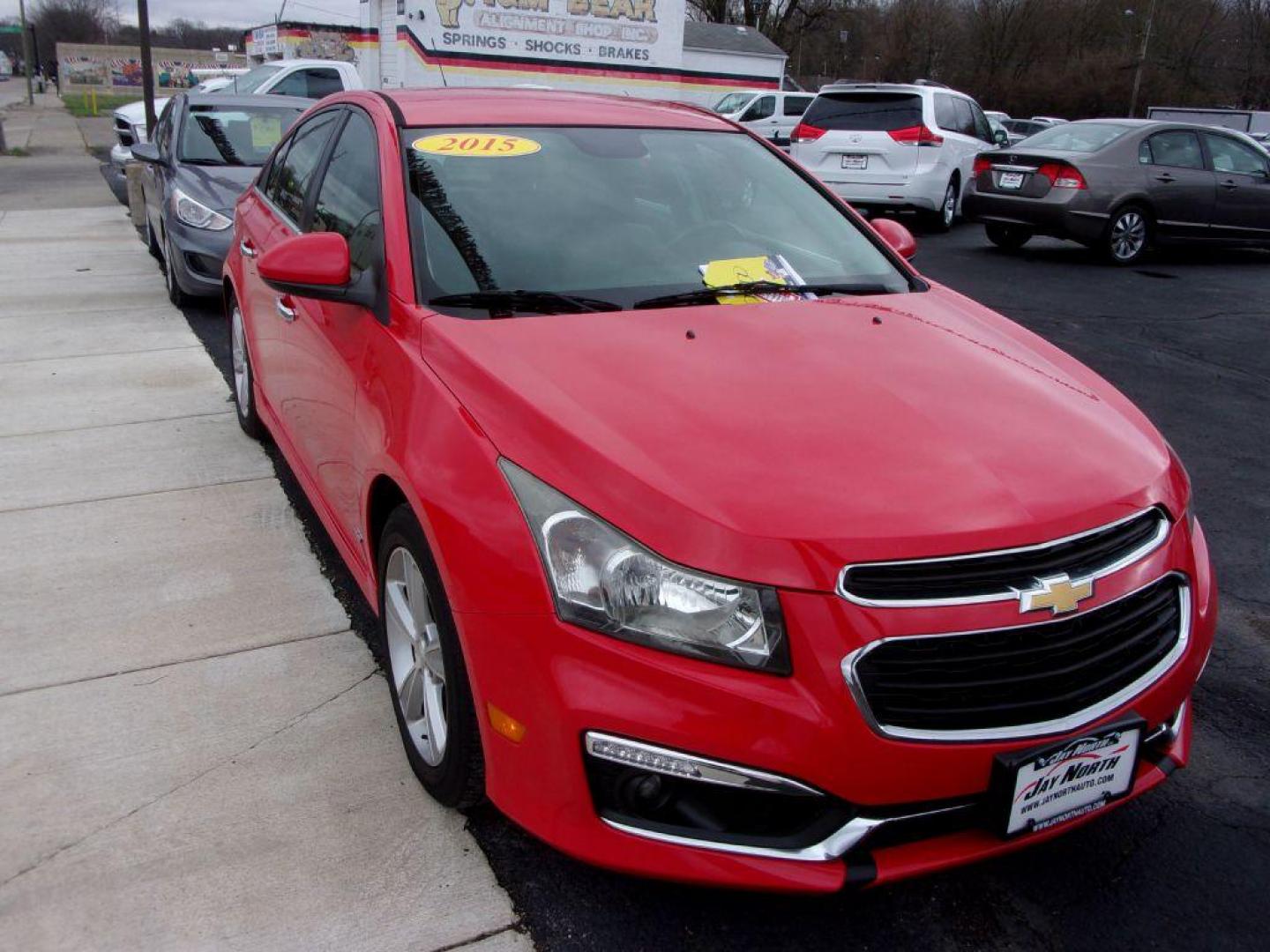 2015 RED CHEVROLET CRUZE 2LT (1G1PE5SB4F7) with an 1.4L engine, Automatic transmission, located at 501 E. Columbia St., Springfield, OH, 45503, (800) 262-7122, 39.925262, -83.801796 - *** LT *** Serviced and Detailed *** Clean CarFax *** FWD *** Gas Saver *** Jay North Auto has offered hand picked vehicles since 1965! Our customer's enjoy a NO pressure buying experience with a small town feel. All of our vehicles get fully inspected and detailed. We are a preferred dealer for - Photo#2