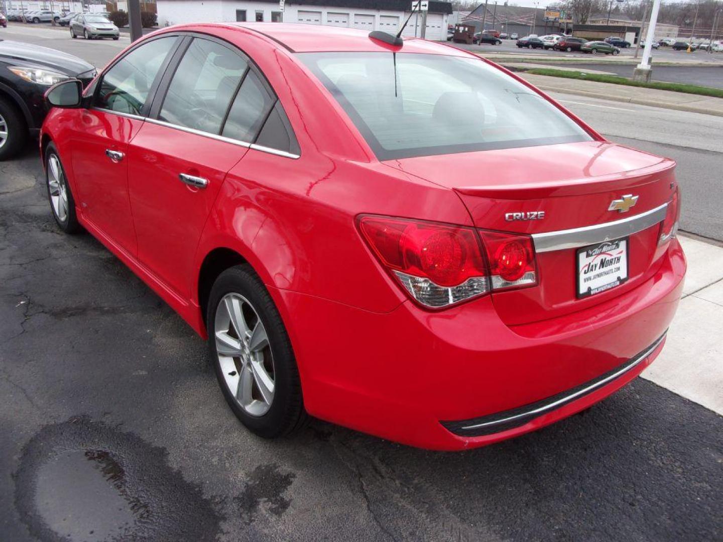 2015 RED CHEVROLET CRUZE 2LT (1G1PE5SB4F7) with an 1.4L engine, Automatic transmission, located at 501 E. Columbia St., Springfield, OH, 45503, (800) 262-7122, 39.925262, -83.801796 - *** LT *** Serviced and Detailed *** Clean CarFax *** FWD *** Gas Saver *** Jay North Auto has offered hand picked vehicles since 1965! Our customer's enjoy a NO pressure buying experience with a small town feel. All of our vehicles get fully inspected and detailed. We are a preferred dealer for - Photo#3