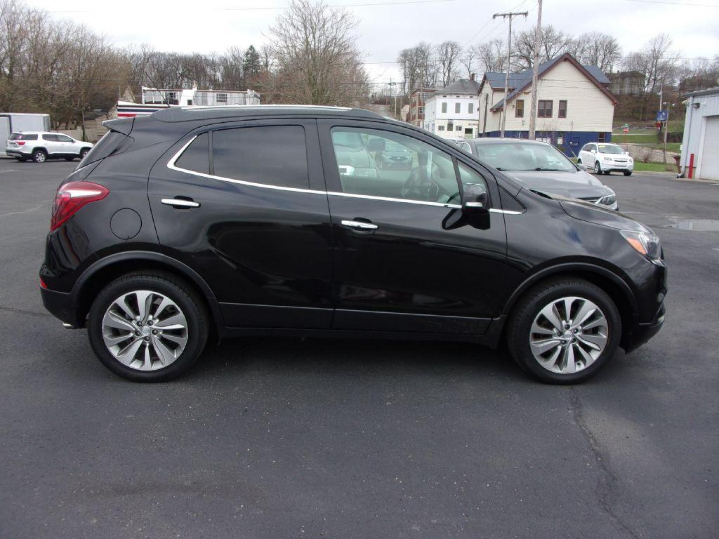 2017 BLACK BUICK ENCORE PREFERRED (KL4CJASB6HB) with an 1.4L engine, Automatic transmission, located at 501 E. Columbia St., Springfield, OH, 45503, (800) 262-7122, 39.925262, -83.801796 - *** 1 Owner w/ 24 Service Records on CarFax *** Preferred *** FWD *** Serviced and Detailed *** Back Up Camera *** Jay North Auto has offered hand picked vehicles since 1965! Our customer's enjoy a NO pressure buying experience with a small town feel. All of our vehicles get fully inspected an - Photo#0