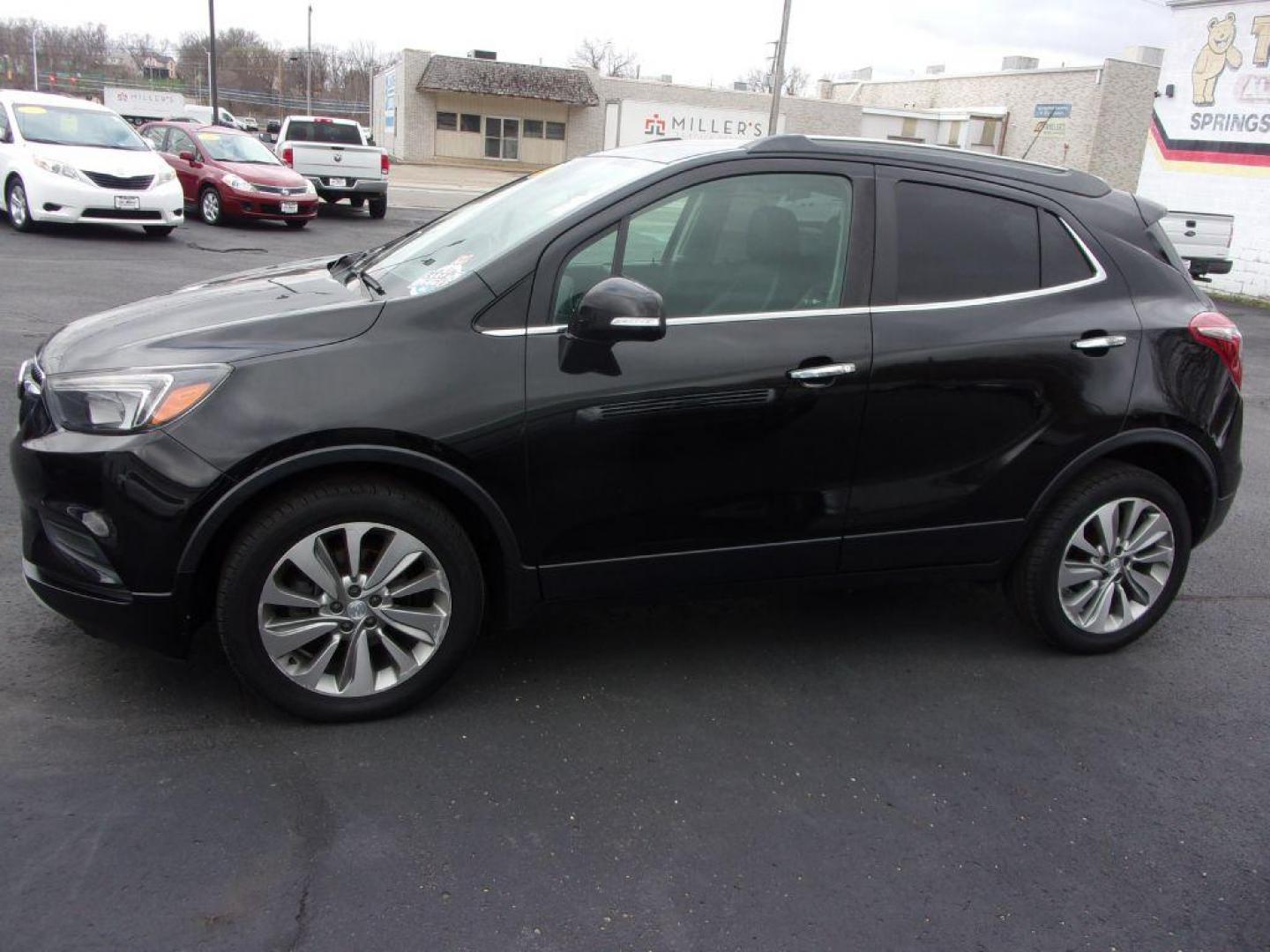 2017 BLACK BUICK ENCORE PREFERRED (KL4CJASB6HB) with an 1.4L engine, Automatic transmission, located at 501 E. Columbia St., Springfield, OH, 45503, (800) 262-7122, 39.925262, -83.801796 - *** 1 Owner w/ 24 Service Records on CarFax *** Preferred *** FWD *** Serviced and Detailed *** Back Up Camera *** Jay North Auto has offered hand picked vehicles since 1965! Our customer's enjoy a NO pressure buying experience with a small town feel. All of our vehicles get fully inspected an - Photo#5