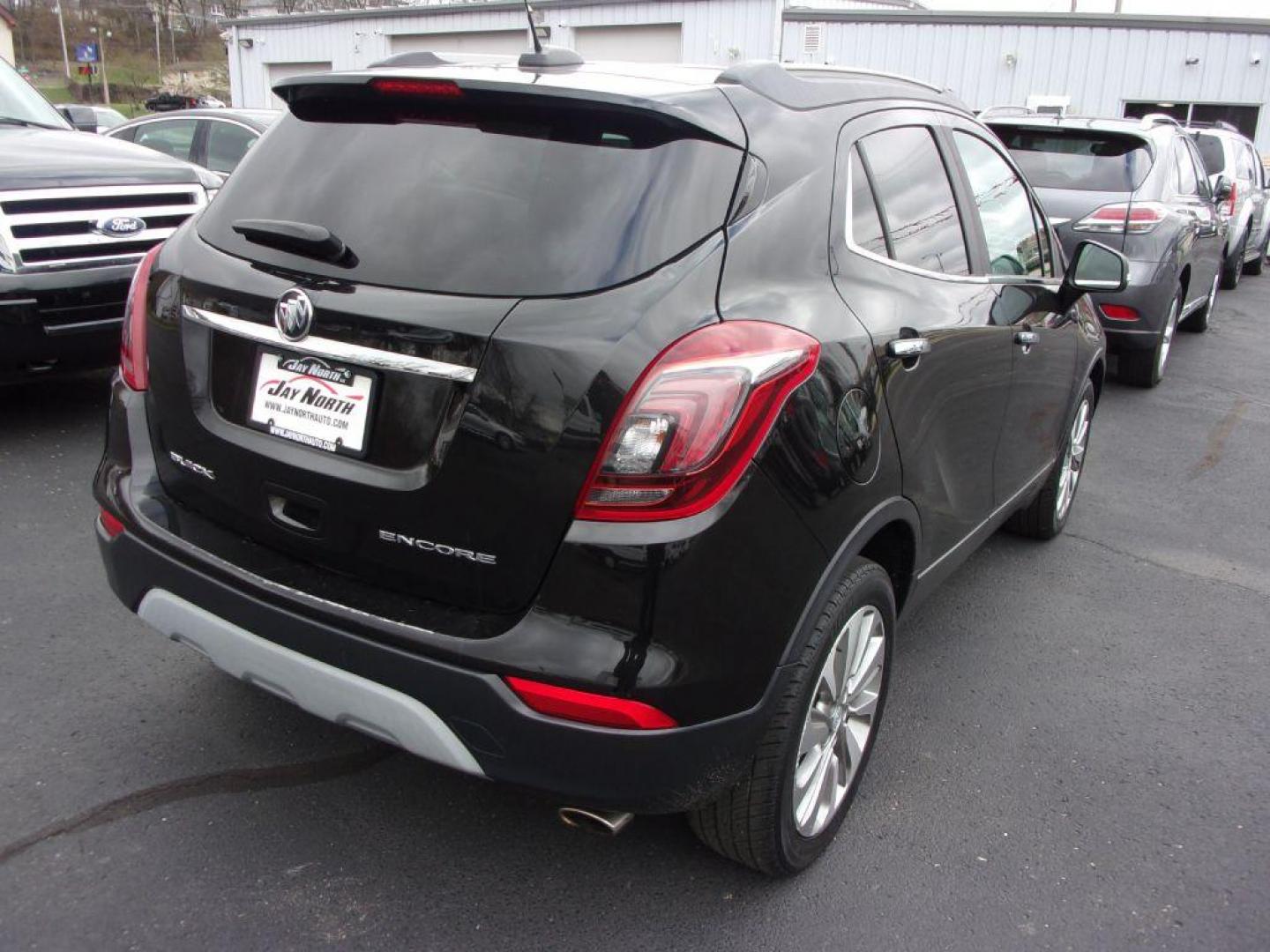 2017 BLACK BUICK ENCORE PREFERRED (KL4CJASB6HB) with an 1.4L engine, Automatic transmission, located at 501 E. Columbia St., Springfield, OH, 45503, (800) 262-7122, 39.925262, -83.801796 - *** 1 Owner w/ 24 Service Records on CarFax *** Preferred *** FWD *** Serviced and Detailed *** Back Up Camera *** Jay North Auto has offered hand picked vehicles since 1965! Our customer's enjoy a NO pressure buying experience with a small town feel. All of our vehicles get fully inspected an - Photo#8