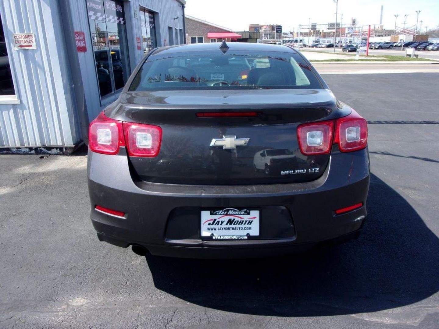 2013 GRAY CHEVROLET MALIBU LTZ (1G11H5SA1DF) with an 2.5L engine, Automatic transmission, located at 501 E. Columbia St., Springfield, OH, 45503, (800) 262-7122, 39.925262, -83.801796 - ***Clean Carfax***LTZ***New Tires***Heated Leather Seating***Serviced and Detailed*** Jay North Auto has offered hand picked vehicles since 1965! Our customer's enjoy a NO pressure buying experience with a small town feel. All of our vehicles get fully inspected and detailed. We are a preferred - Photo#4