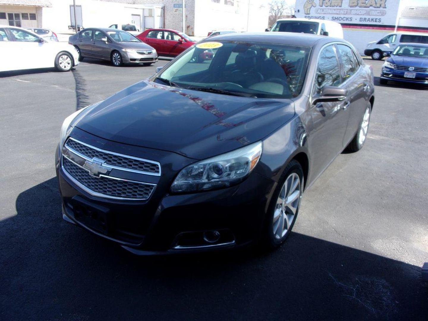 2013 GRAY CHEVROLET MALIBU LTZ (1G11H5SA1DF) with an 2.5L engine, Automatic transmission, located at 501 E. Columbia St., Springfield, OH, 45503, (800) 262-7122, 39.925262, -83.801796 - ***Clean Carfax***LTZ***New Tires***Heated Leather Seating***Serviced and Detailed*** Jay North Auto has offered hand picked vehicles since 1965! Our customer's enjoy a NO pressure buying experience with a small town feel. All of our vehicles get fully inspected and detailed. We are a preferred - Photo#6