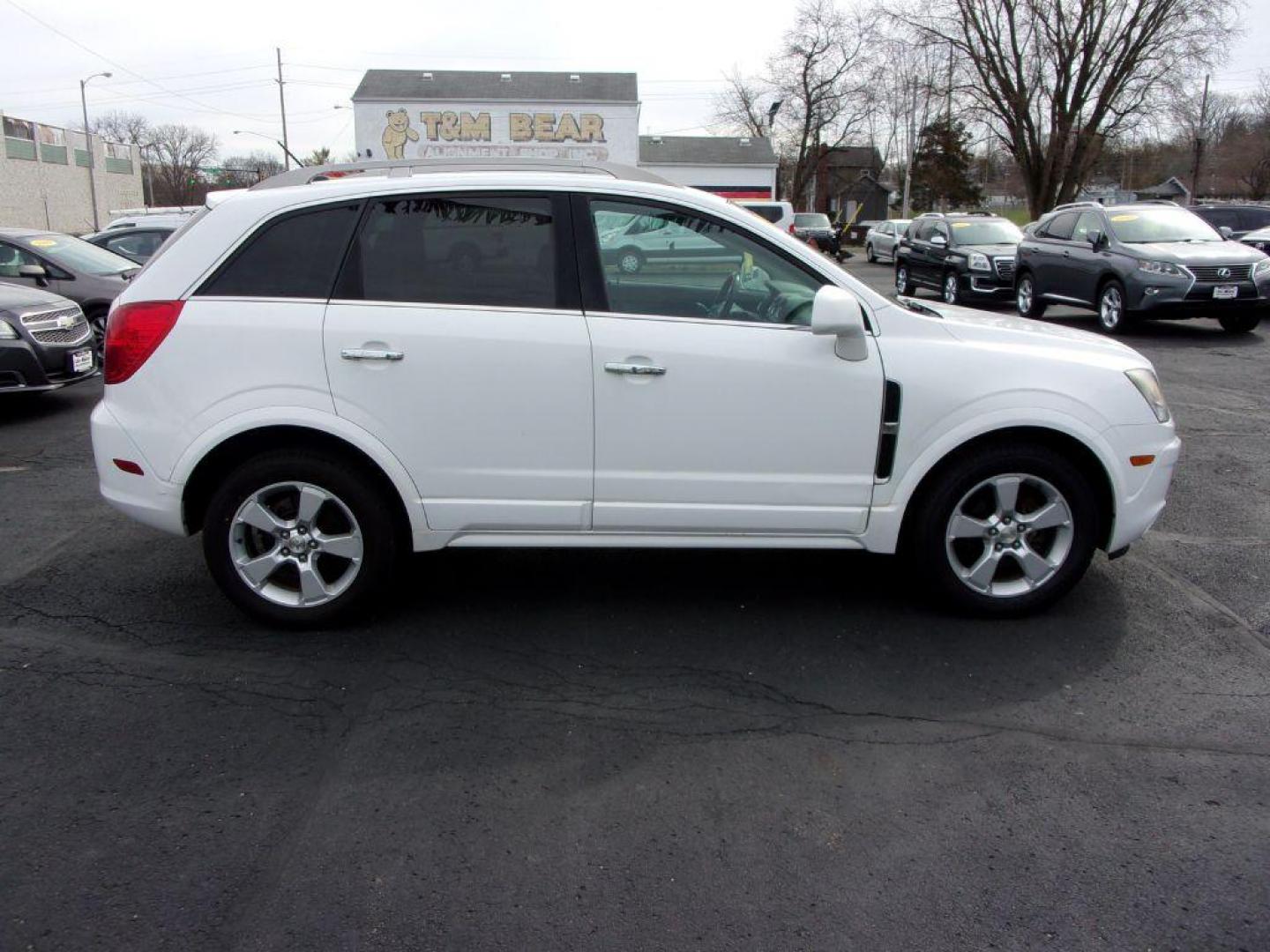 2015 WHITE CHEVROLET CAPTIVA LT (3GNAL3EK8FS) with an 2.4L engine, Automatic transmission, located at 501 E. Columbia St., Springfield, OH, 45503, (800) 262-7122, 39.925262, -83.801796 - Photo#0