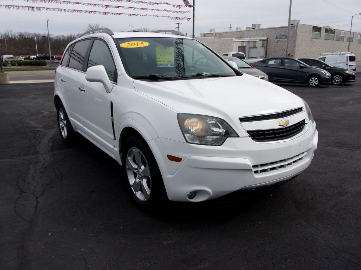 2015 WHITE CHEVROLET CAPTIVA LT (3GNAL3EK8FS) with an 2.4L engine, Automatic transmission, located at 501 E. Columbia St., Springfield, OH, 45503, (800) 262-7122, 39.925262, -83.801796 - Photo#2