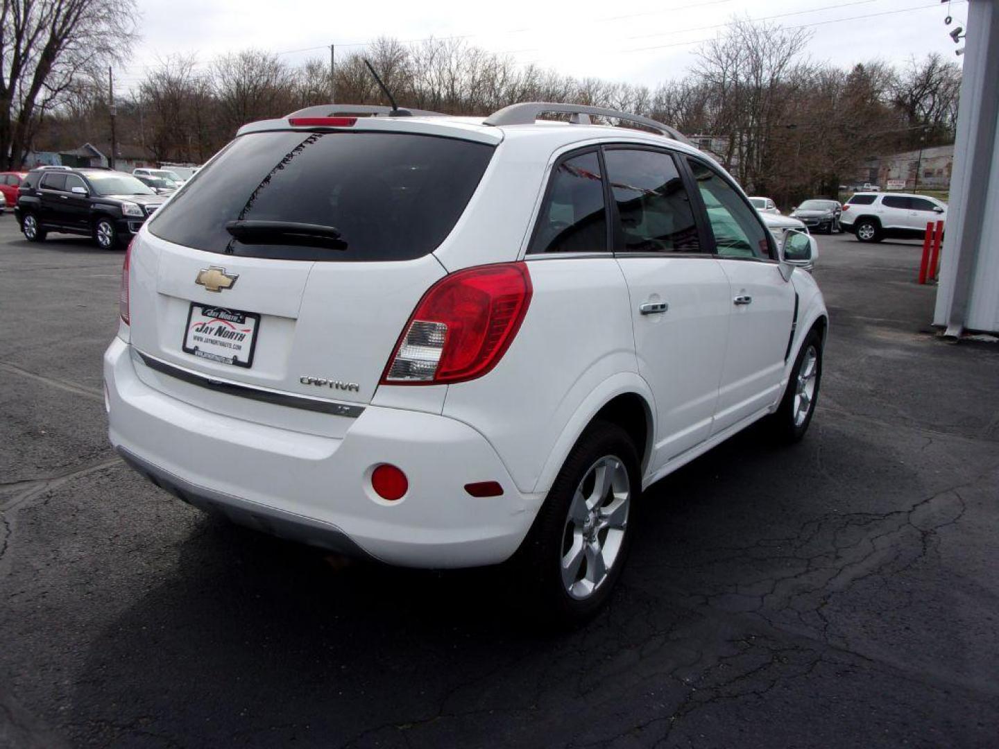 2015 WHITE CHEVROLET CAPTIVA LT (3GNAL3EK8FS) with an 2.4L engine, Automatic transmission, located at 501 E. Columbia St., Springfield, OH, 45503, (800) 262-7122, 39.925262, -83.801796 - Photo#3