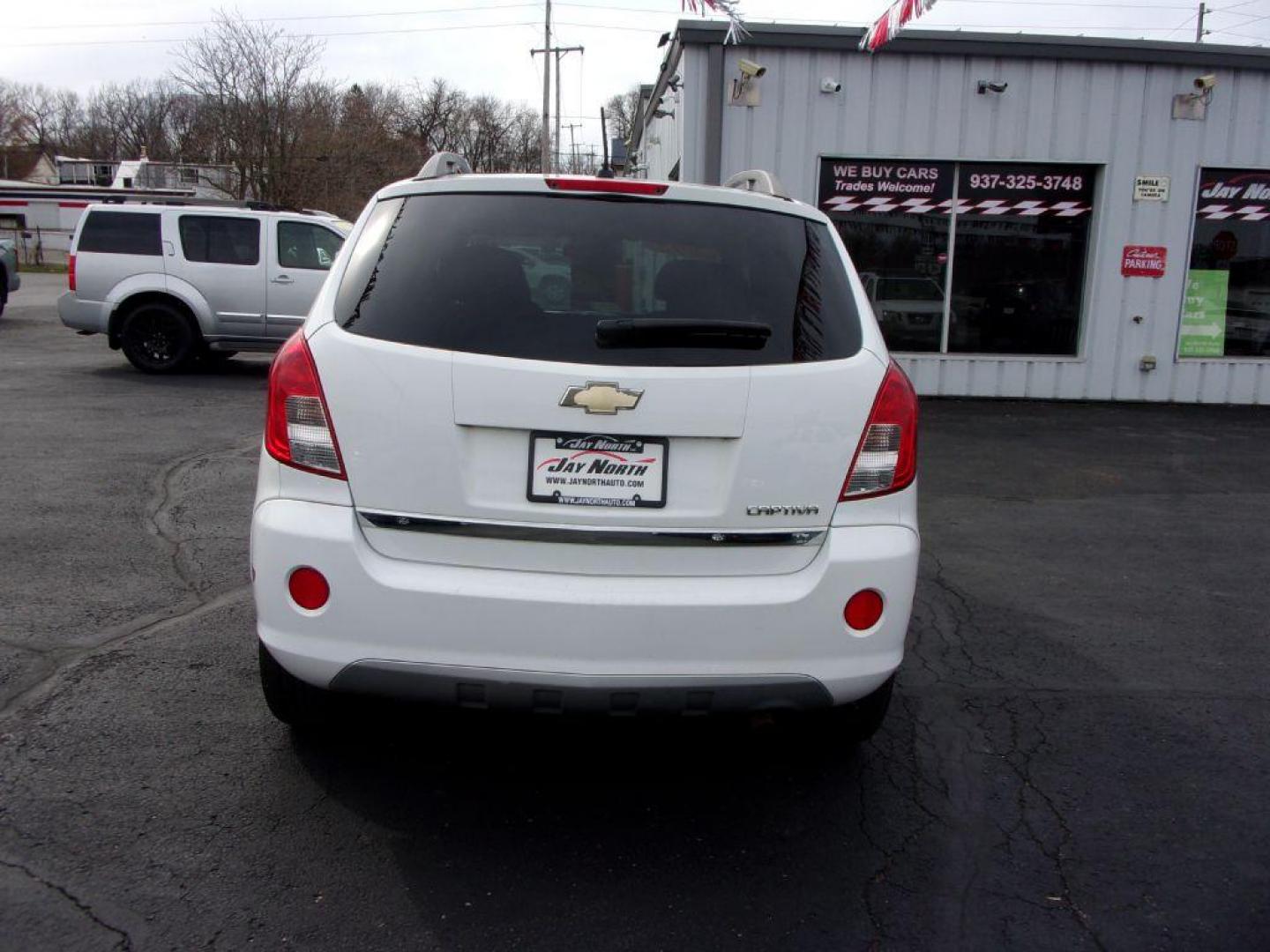 2015 WHITE CHEVROLET CAPTIVA LT (3GNAL3EK8FS) with an 2.4L engine, Automatic transmission, located at 501 E. Columbia St., Springfield, OH, 45503, (800) 262-7122, 39.925262, -83.801796 - Photo#4