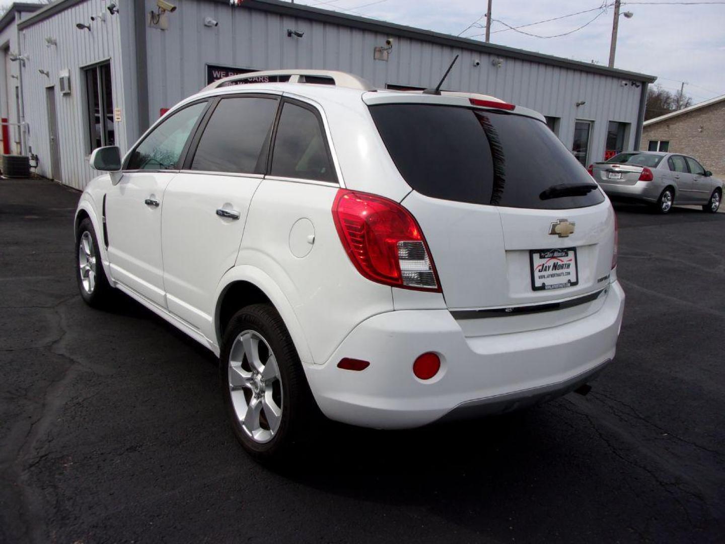 2015 WHITE CHEVROLET CAPTIVA LT (3GNAL3EK8FS) with an 2.4L engine, Automatic transmission, located at 501 E. Columbia St., Springfield, OH, 45503, (800) 262-7122, 39.925262, -83.801796 - Photo#5