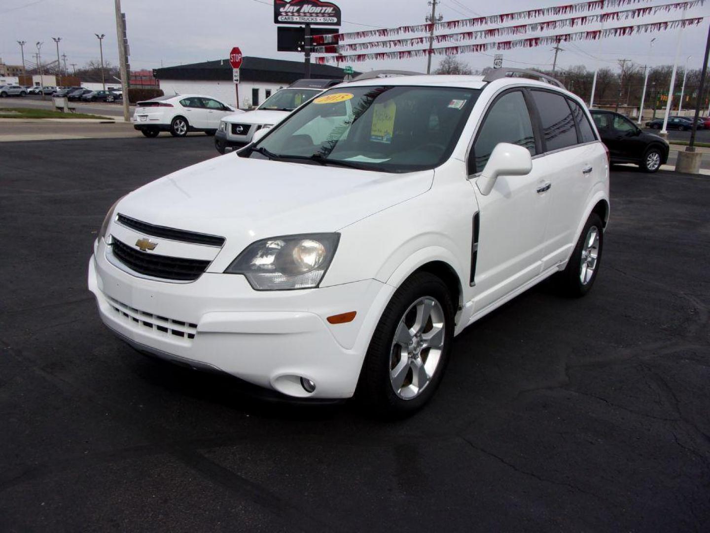 2015 WHITE CHEVROLET CAPTIVA LT (3GNAL3EK8FS) with an 2.4L engine, Automatic transmission, located at 501 E. Columbia St., Springfield, OH, 45503, (800) 262-7122, 39.925262, -83.801796 - Photo#6