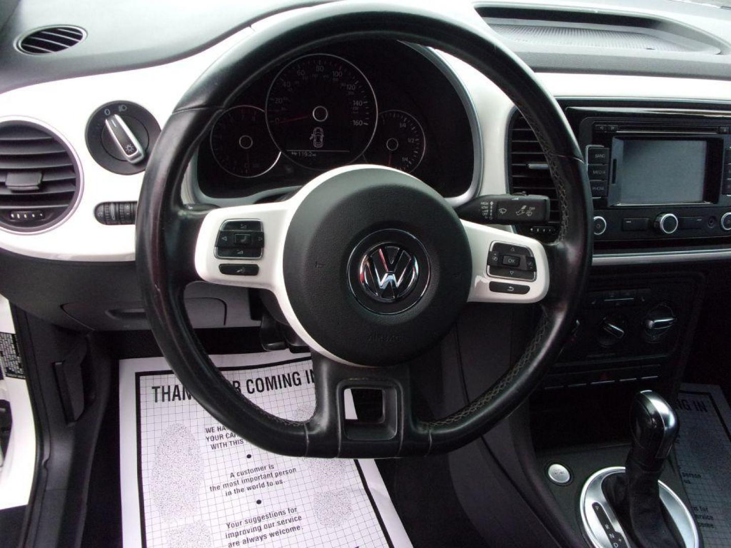 2012 WHITE VOLKSWAGEN BEETLE (3VWJP7AT8CM) with an 2.5L engine, Automatic transmission, located at 501 E. Columbia St., Springfield, OH, 45503, (800) 262-7122, 39.925262, -83.801796 - ***Clean Carfax***2.5L***Heated Leather Seating***Fender Audio***Navigation***Serviced and Detailed*** Jay North Auto has offered hand picked vehicles since 1965! Our customer's enjoy a NO pressure buying experience with a small town feel. All of our vehicles get fully inspected and detailed. We - Photo#9