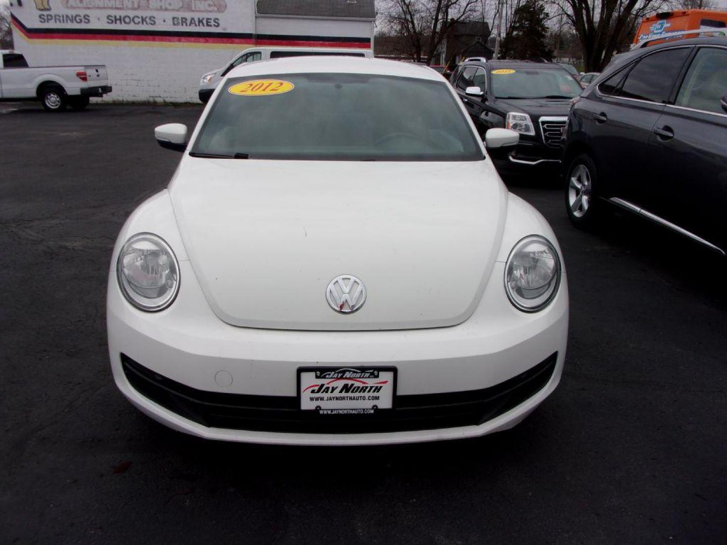 2012 WHITE VOLKSWAGEN BEETLE (3VWJP7AT8CM) with an 2.5L engine, Automatic transmission, located at 501 E. Columbia St., Springfield, OH, 45503, (800) 262-7122, 39.925262, -83.801796 - ***Clean Carfax***2.5L***Heated Leather Seating***Fender Audio***Navigation***Serviced and Detailed*** Jay North Auto has offered hand picked vehicles since 1965! Our customer's enjoy a NO pressure buying experience with a small town feel. All of our vehicles get fully inspected and detailed. We - Photo#1