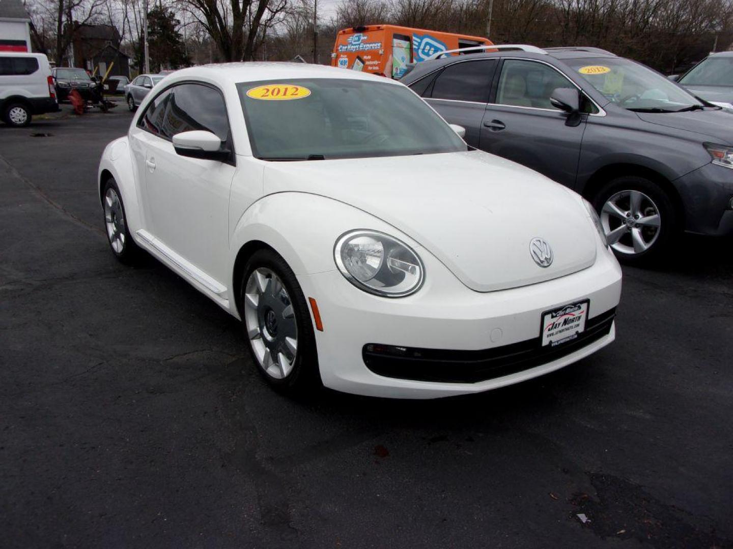 2012 WHITE VOLKSWAGEN BEETLE (3VWJP7AT8CM) with an 2.5L engine, Automatic transmission, located at 501 E. Columbia St., Springfield, OH, 45503, (800) 262-7122, 39.925262, -83.801796 - ***Clean Carfax***2.5L***Heated Leather Seating***Fender Audio***Navigation***Serviced and Detailed*** Jay North Auto has offered hand picked vehicles since 1965! Our customer's enjoy a NO pressure buying experience with a small town feel. All of our vehicles get fully inspected and detailed. We - Photo#2