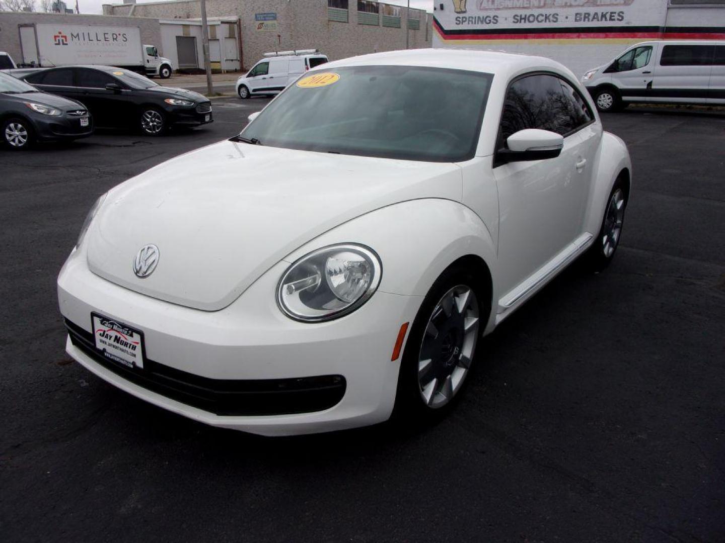 2012 WHITE VOLKSWAGEN BEETLE (3VWJP7AT8CM) with an 2.5L engine, Automatic transmission, located at 501 E. Columbia St., Springfield, OH, 45503, (800) 262-7122, 39.925262, -83.801796 - ***Clean Carfax***2.5L***Heated Leather Seating***Fender Audio***Navigation***Serviced and Detailed*** Jay North Auto has offered hand picked vehicles since 1965! Our customer's enjoy a NO pressure buying experience with a small town feel. All of our vehicles get fully inspected and detailed. We - Photo#6