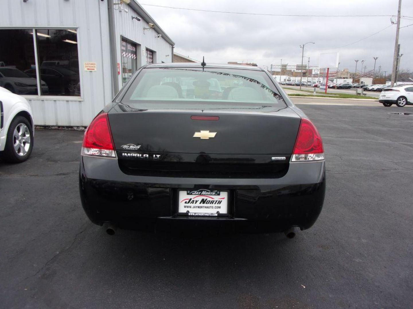 2016 BLACK CHEVROLET IMPALA LIMITED LT (2G1WB5E35G1) with an 3.6L engine, Automatic transmission, located at 501 E. Columbia St., Springfield, OH, 45503, (800) 262-7122, 39.925262, -83.801796 - Photo#4