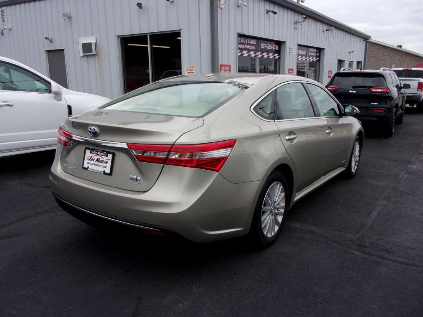 2014 TAN TOYOTA AVALON HYBRID XLE TOURING (4T1BD1EB1EU) with an 2.5L engine, Automatic transmission, located at 501 E. Columbia St., Springfield, OH, 45503, (800) 262-7122, 39.925262, -83.801796 - Photo#3