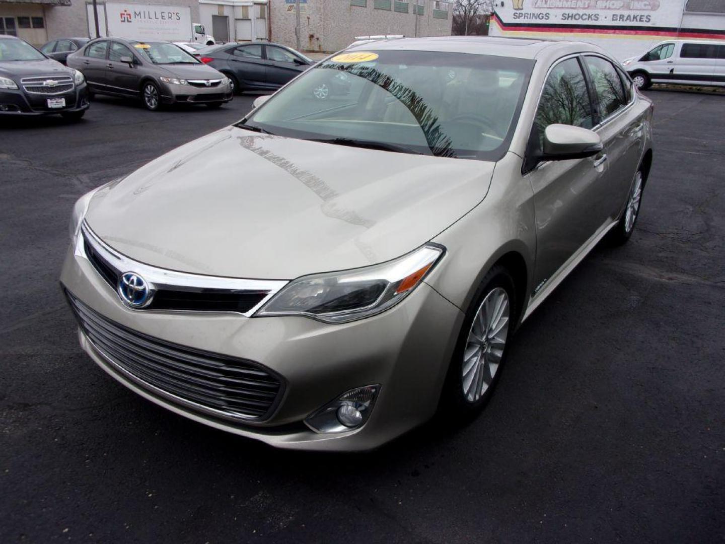 2014 TAN TOYOTA AVALON HYBRID XLE TOURING (4T1BD1EB1EU) with an 2.5L engine, Automatic transmission, located at 501 E. Columbia St., Springfield, OH, 45503, (800) 262-7122, 39.925262, -83.801796 - Photo#6