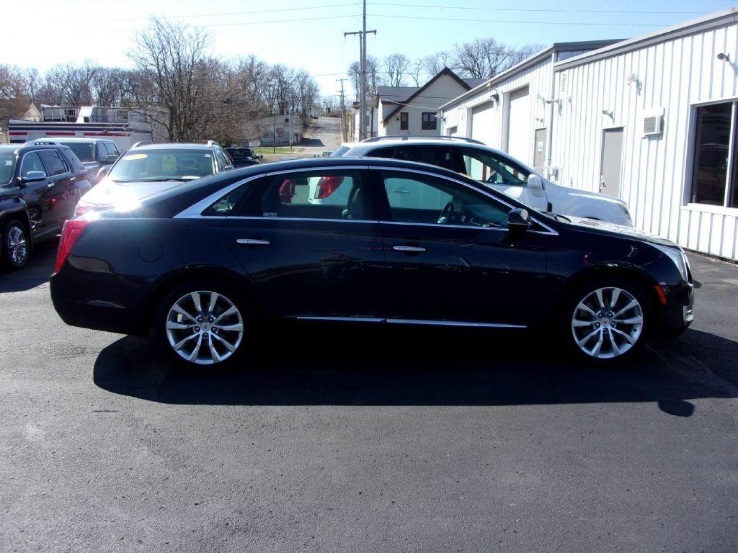 2015 BLUE CADILLAC XTS LUXURY COLLECTION (2G61M5S38F9) with an 3.6L engine, Automatic transmission, located at 501 E. Columbia St., Springfield, OH, 45503, (800) 262-7122, 39.925262, -83.801796 - ***1-Owner***LOADED***Heated and Cooled Leather Seating***Dual Panel Moonroof***Memory Seats***BOSE Audio***Only 70k Miles***Serviced and Detailed*** Jay North Auto has offered hand picked vehicles since 1965! Our customer's enjoy a NO pressure buying experience with a small town feel. All of ou - Photo#0