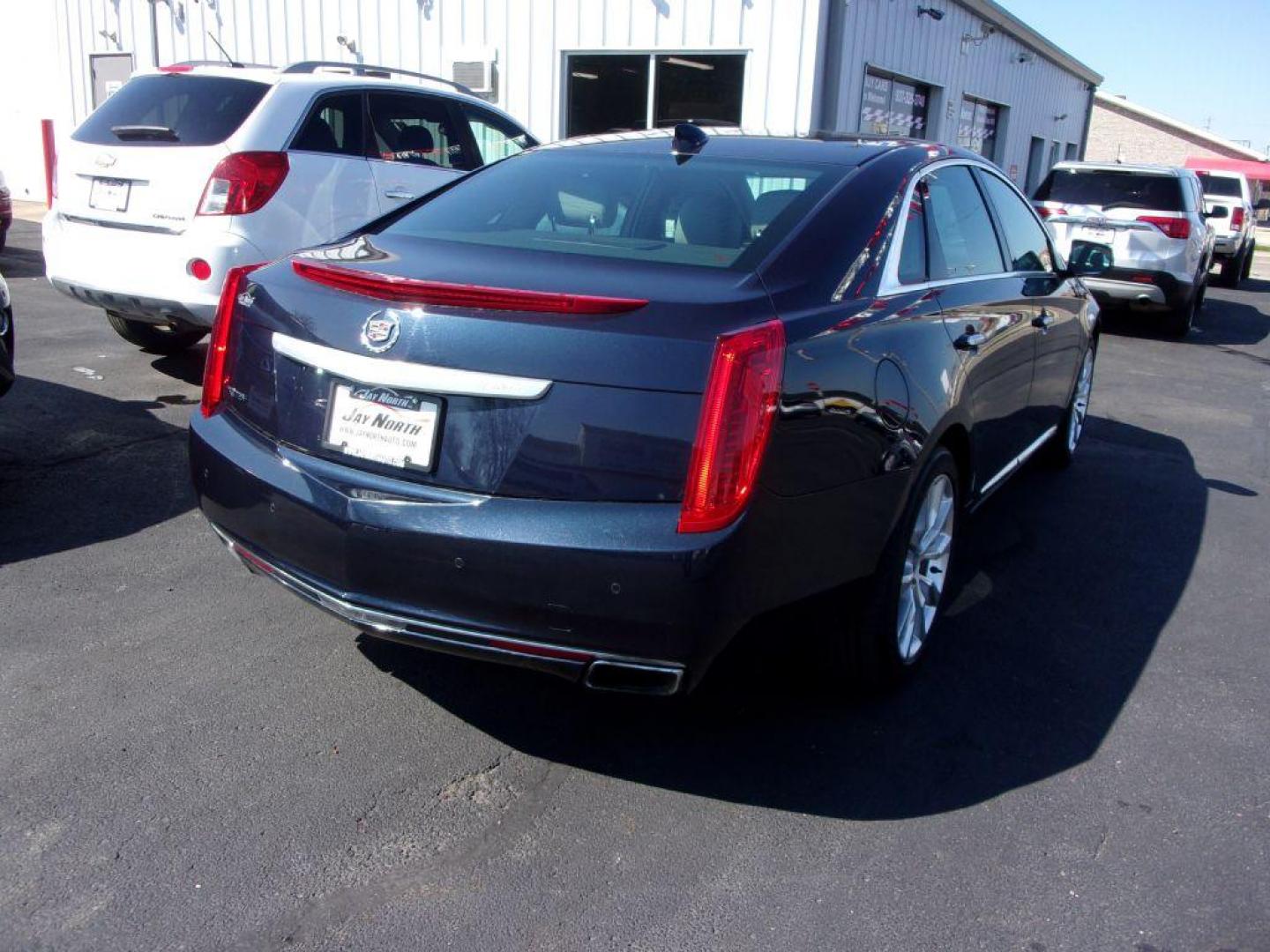 2015 BLUE CADILLAC XTS LUXURY COLLECTION (2G61M5S38F9) with an 3.6L engine, Automatic transmission, located at 501 E. Columbia St., Springfield, OH, 45503, (800) 262-7122, 39.925262, -83.801796 - ***1-Owner***LOADED***Heated and Cooled Leather Seating***Dual Panel Moonroof***Memory Seats***BOSE Audio***Only 70k Miles***Serviced and Detailed*** Jay North Auto has offered hand picked vehicles since 1965! Our customer's enjoy a NO pressure buying experience with a small town feel. All of ou - Photo#3