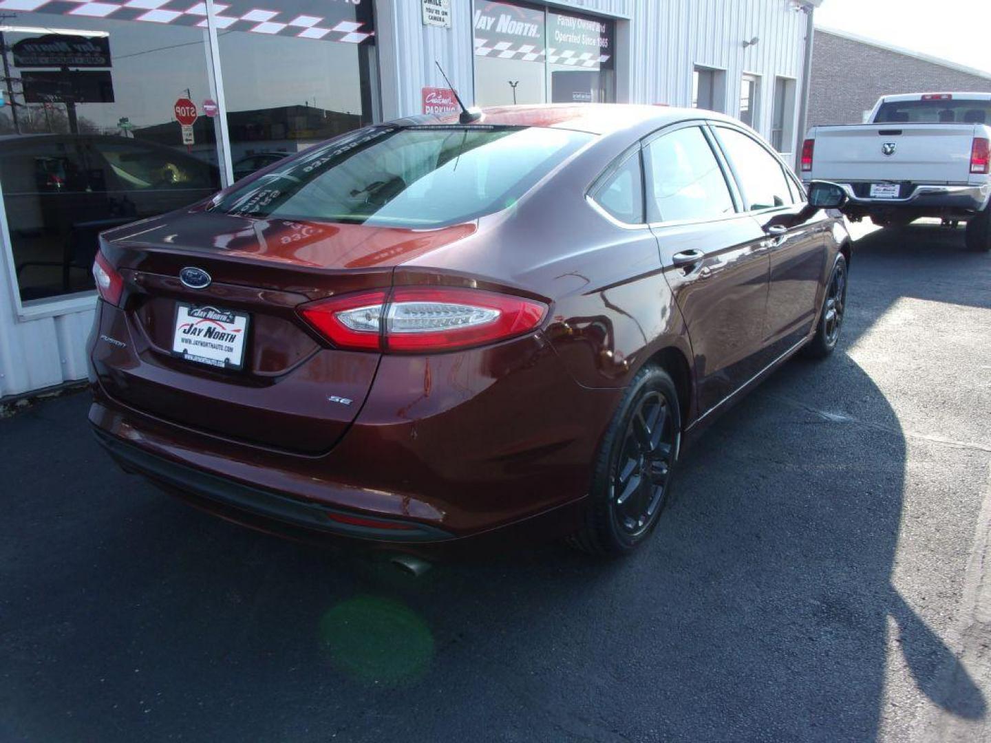 2015 BROWN FORD FUSION SE (3FA6P0H78FR) with an 2.5L engine, Automatic transmission, located at 501 E. Columbia St., Springfield, OH, 45503, (800) 262-7122, 39.925262, -83.801796 - ***New Tires***New Front and Rear Pads and Rotors***SE***Serviced and Detailed*** Jay North Auto has offered hand picked vehicles since 1965! Our customer's enjoy a NO pressure buying experience with a small town feel. All of our vehicles get fully inspected and detailed. We are a preferred deal - Photo#3