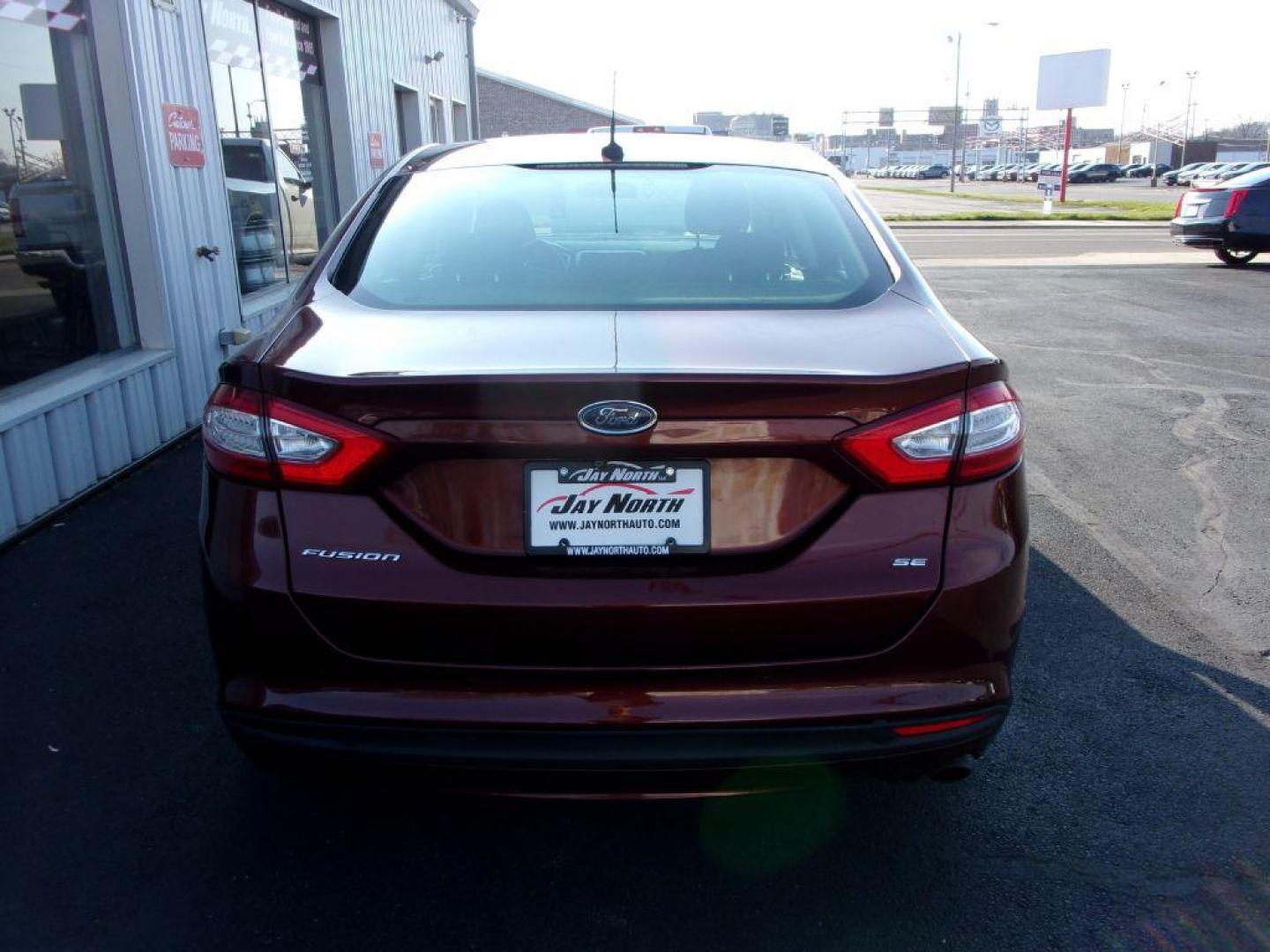 2015 BROWN FORD FUSION SE (3FA6P0H78FR) with an 2.5L engine, Automatic transmission, located at 501 E. Columbia St., Springfield, OH, 45503, (800) 262-7122, 39.925262, -83.801796 - ***New Tires***New Front and Rear Pads and Rotors***SE***Serviced and Detailed*** Jay North Auto has offered hand picked vehicles since 1965! Our customer's enjoy a NO pressure buying experience with a small town feel. All of our vehicles get fully inspected and detailed. We are a preferred deal - Photo#4