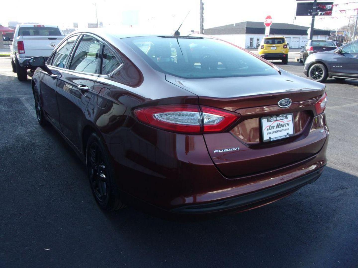 2015 BROWN FORD FUSION SE (3FA6P0H78FR) with an 2.5L engine, Automatic transmission, located at 501 E. Columbia St., Springfield, OH, 45503, (800) 262-7122, 39.925262, -83.801796 - ***New Tires***New Front and Rear Pads and Rotors***SE***Serviced and Detailed*** Jay North Auto has offered hand picked vehicles since 1965! Our customer's enjoy a NO pressure buying experience with a small town feel. All of our vehicles get fully inspected and detailed. We are a preferred deal - Photo#5