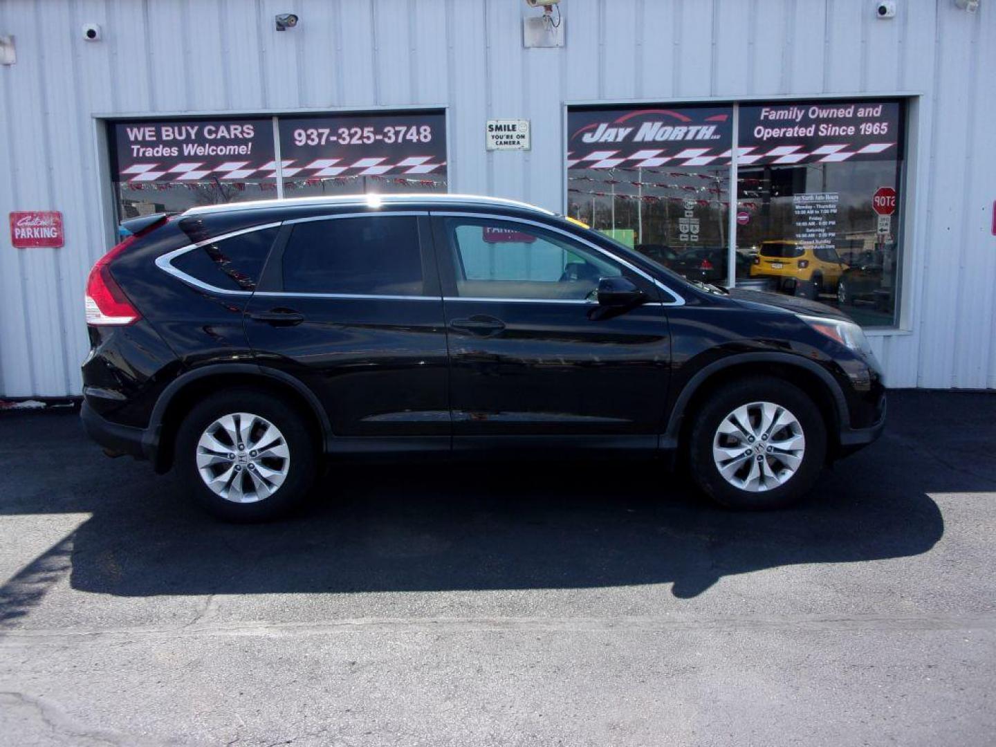 2013 BLACK HONDA CR-V EXL (2HKRM4H77DH) with an 2.4L engine, Automatic transmission, located at 501 E. Columbia St., Springfield, OH, 45503, (800) 262-7122, 39.925262, -83.801796 - ***Clean Carfax***AWD***EXL***Heated Leather Seating***Moonroof***Serviced and Detailed*** Jay North Auto has offered hand picked vehicles since 1965! Our customer's enjoy a NO pressure buying experience with a small town feel. All of our vehicles get fully inspected and detailed. We are a prefe - Photo#0